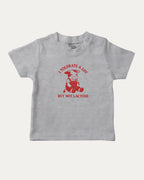 I Tolerate A Lot But Not Lactose graphic tee with cute cow print, funny and trendy graphic. Perfect for adults and gift-giving. Heather Grey shirt.