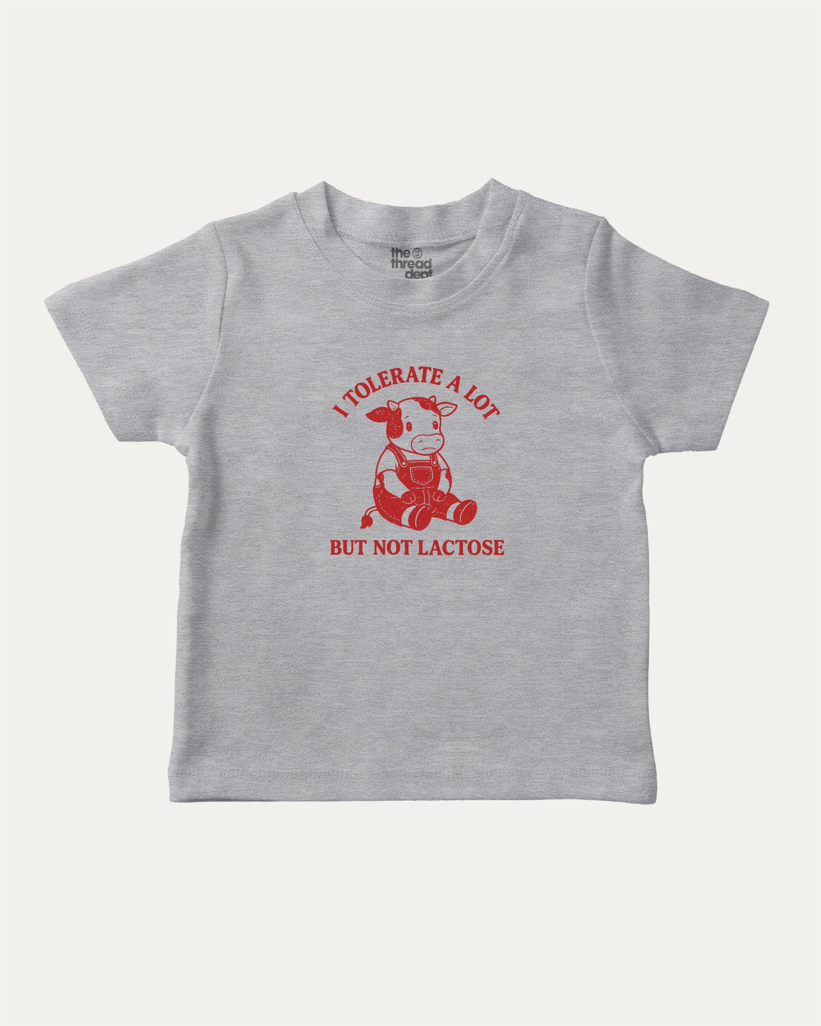 I Tolerate A Lot But Not Lactose graphic tee with cute cow print, funny and trendy graphic. Perfect for adults and gift-giving. Heather Grey shirt.
