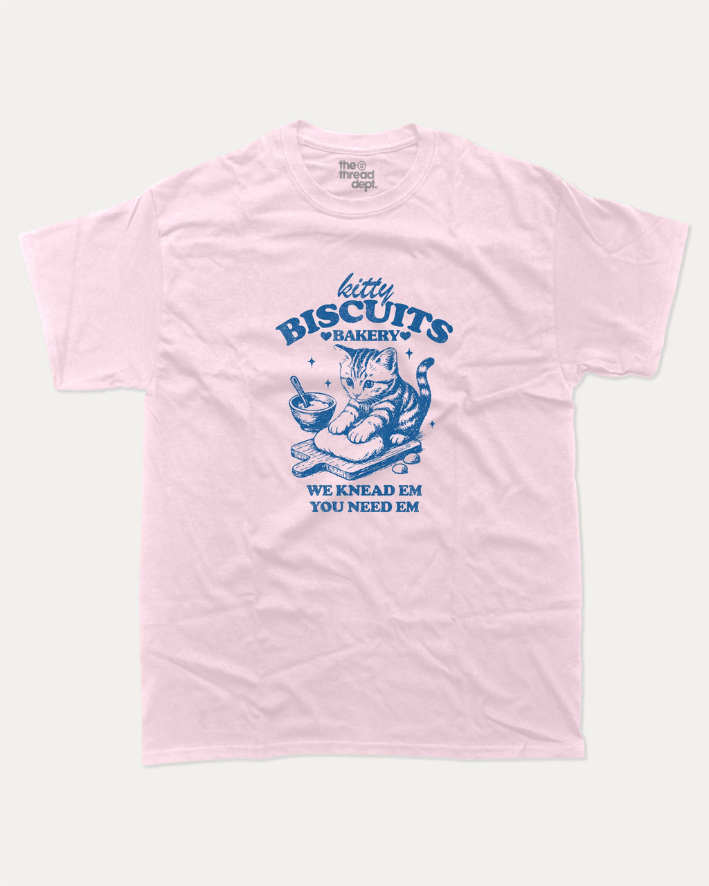 Kitty Biscuits Bakery graphic tee with bold and humorous print, funny and trendy graphic. Funny Cat Graphic T shirt, Gift for Cat Lover, Cat Graphic T shirt, Cute Cat tee, Perfect for adults and gift-giving. Pink shirt.