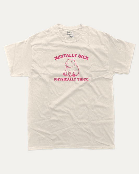 Mentally Sick Physically Thicc Capybara graphic t-shirt, perfect for funny gifts. Funny Capybara tee, trending meme shirt, unique gift idea. Cream.
