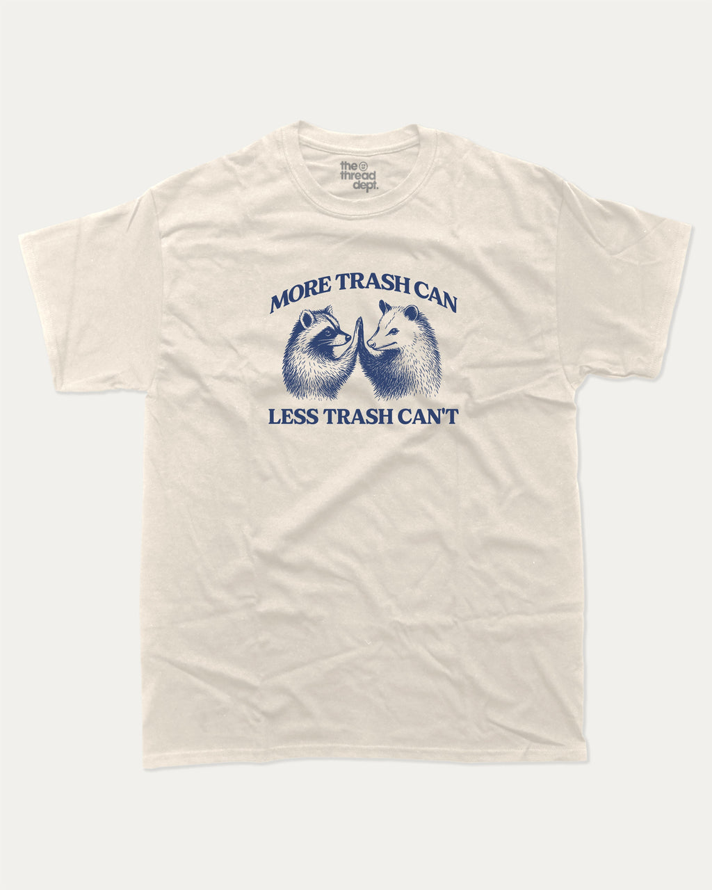 More trash can Less trash can't graphic tee with funny raccoon and possum print, funny and trendy graphic. Perfect for adults and gift-giving. Cream shirt.