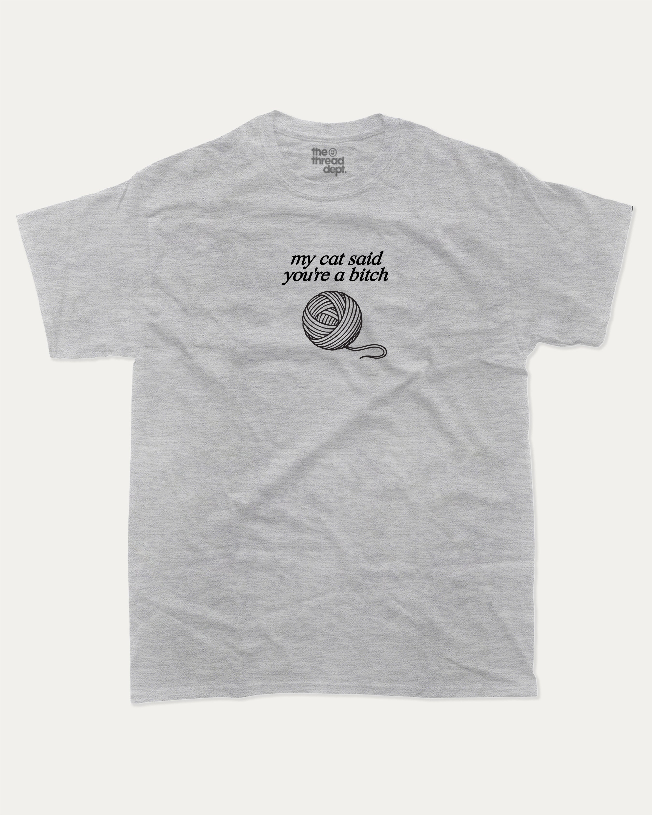 my cat said you're a bitch graphic tee with bold and humorous print, Funny Animal Graphic Tee, Animal Lover tee, funny and trendy graphic. Perfect for adults and gift-giving. Heather Grey shirt.