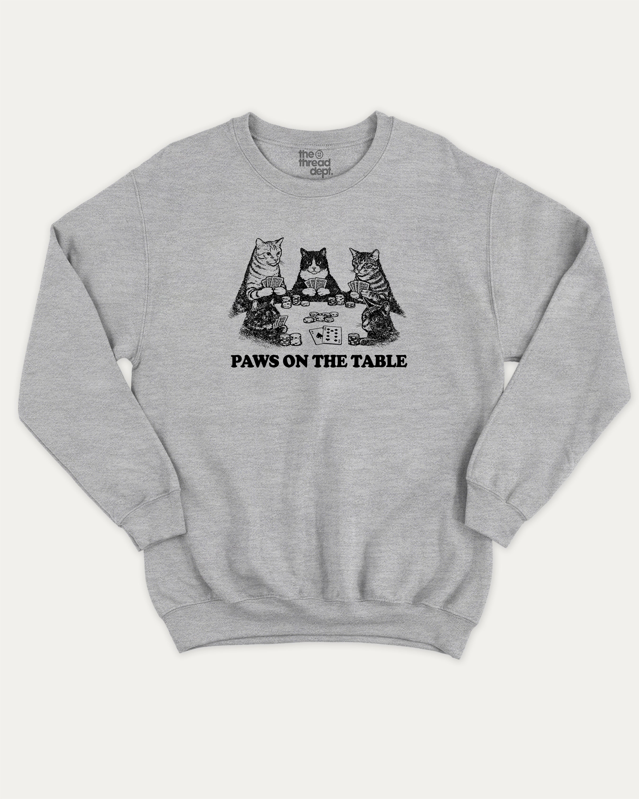 Paws On the Table graphic sweatshirt with bold and humorous print, warm and cozy graphic for everyday wear. Perfect for adults and gift-giving. Heather Grey pullover.
