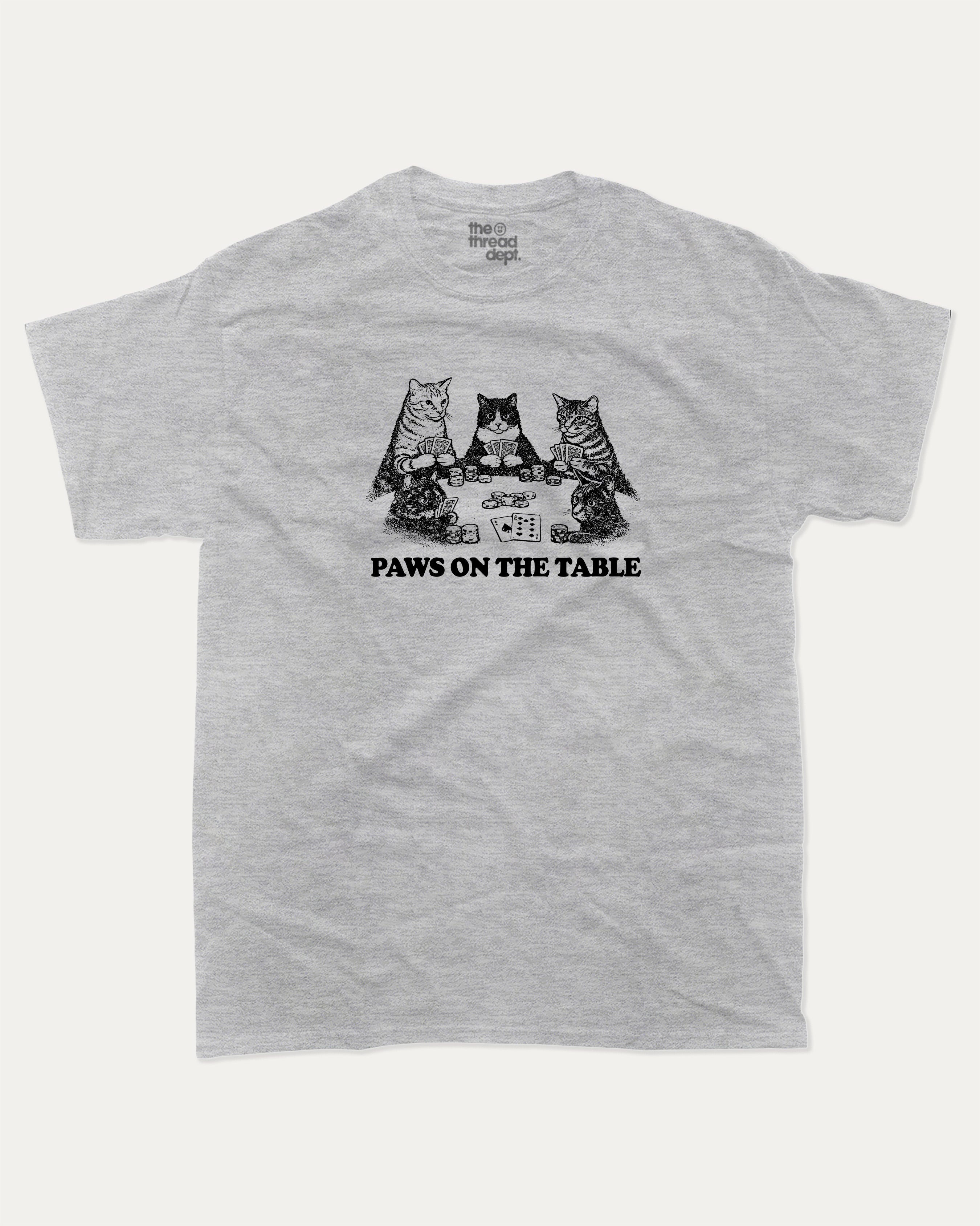 Paws On the Table graphic tee with bold and humorous print, funny and trendy graphic. Perfect for adults and gift-giving. Ash Grey shirt.