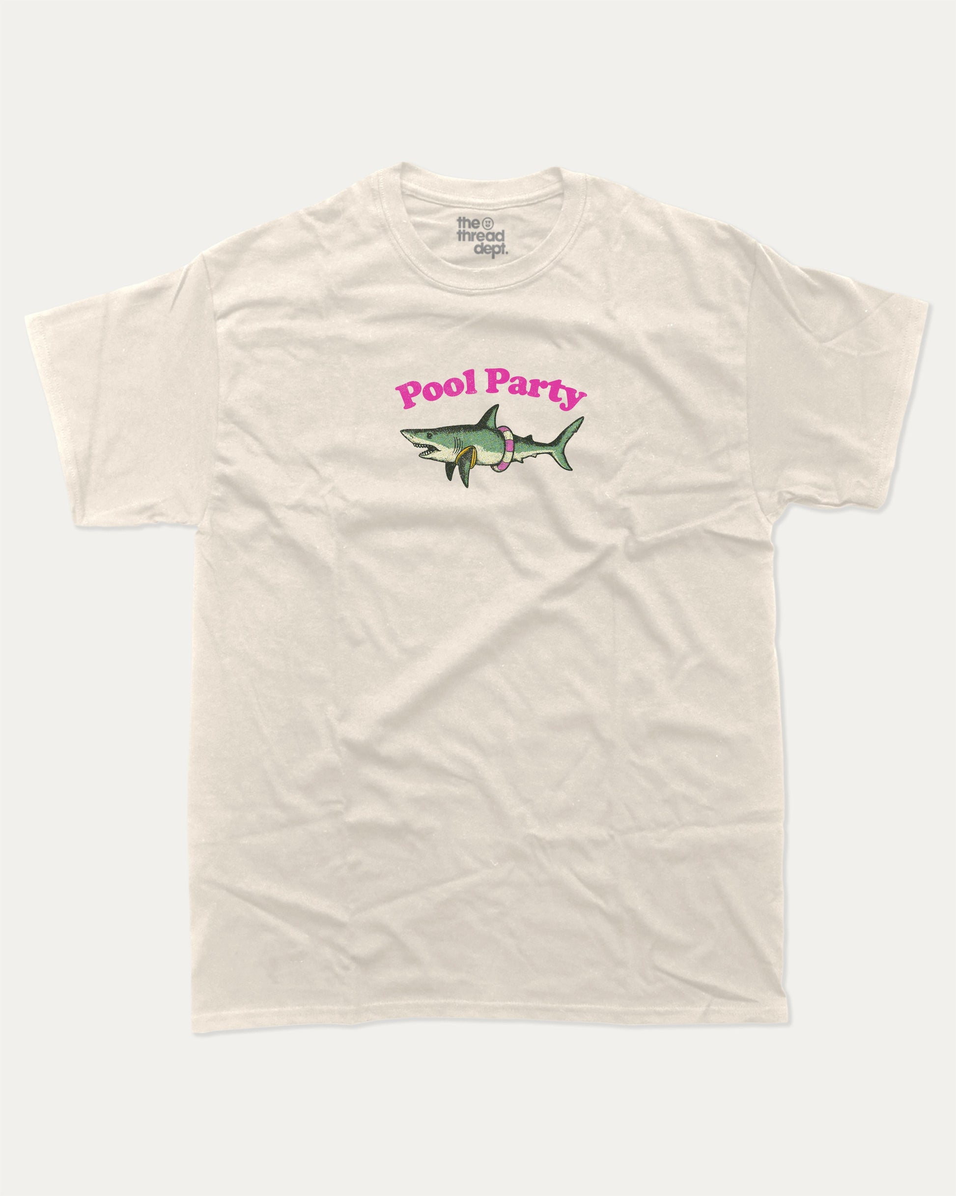 Pool Party graphic tee with bold and humorous print, Funny Shark Graphic Tee, Funny Animal Graphic T shirt, Perfect Gift for Shark Lover, Pun Graphic T shirt, funny and trendy graphic. Perfect for adults and gift-giving. Cream shirt.