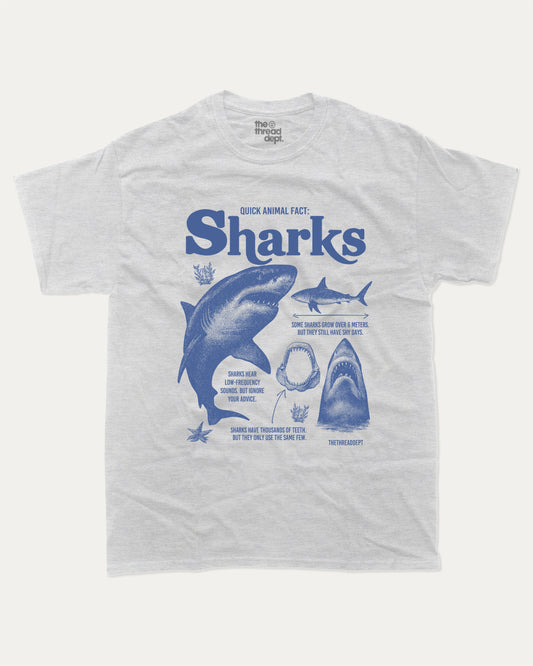 Quick Animal Fact Sharks graphic t-shirt, perfect for gifts. Vintage Sharks tee, Vintage ocean graphic shirt, unique gift idea. Ash Grey .