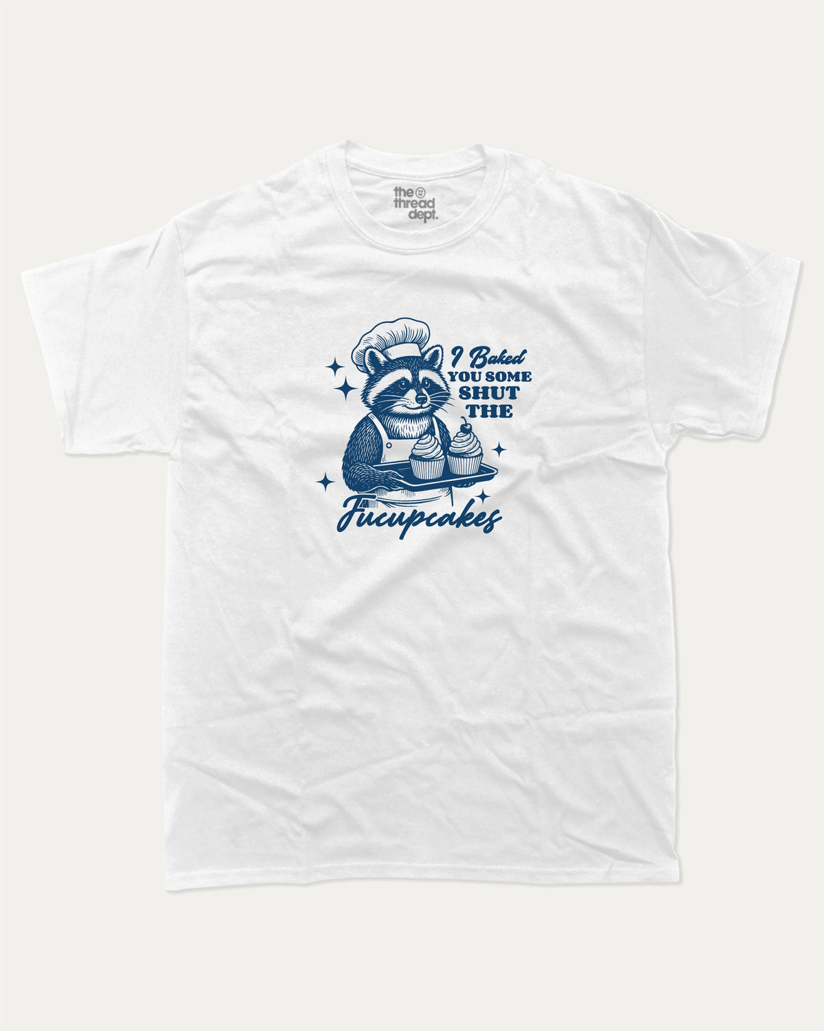 Shut The Fucupcakes Racoon graphic t-shirt, Funny Animal Graphic T shirt, Humorous Animal T shirt, Cute Animal Graphic T shirt, A must-have funny tee, trending meme shirt, unique gift idea. White.