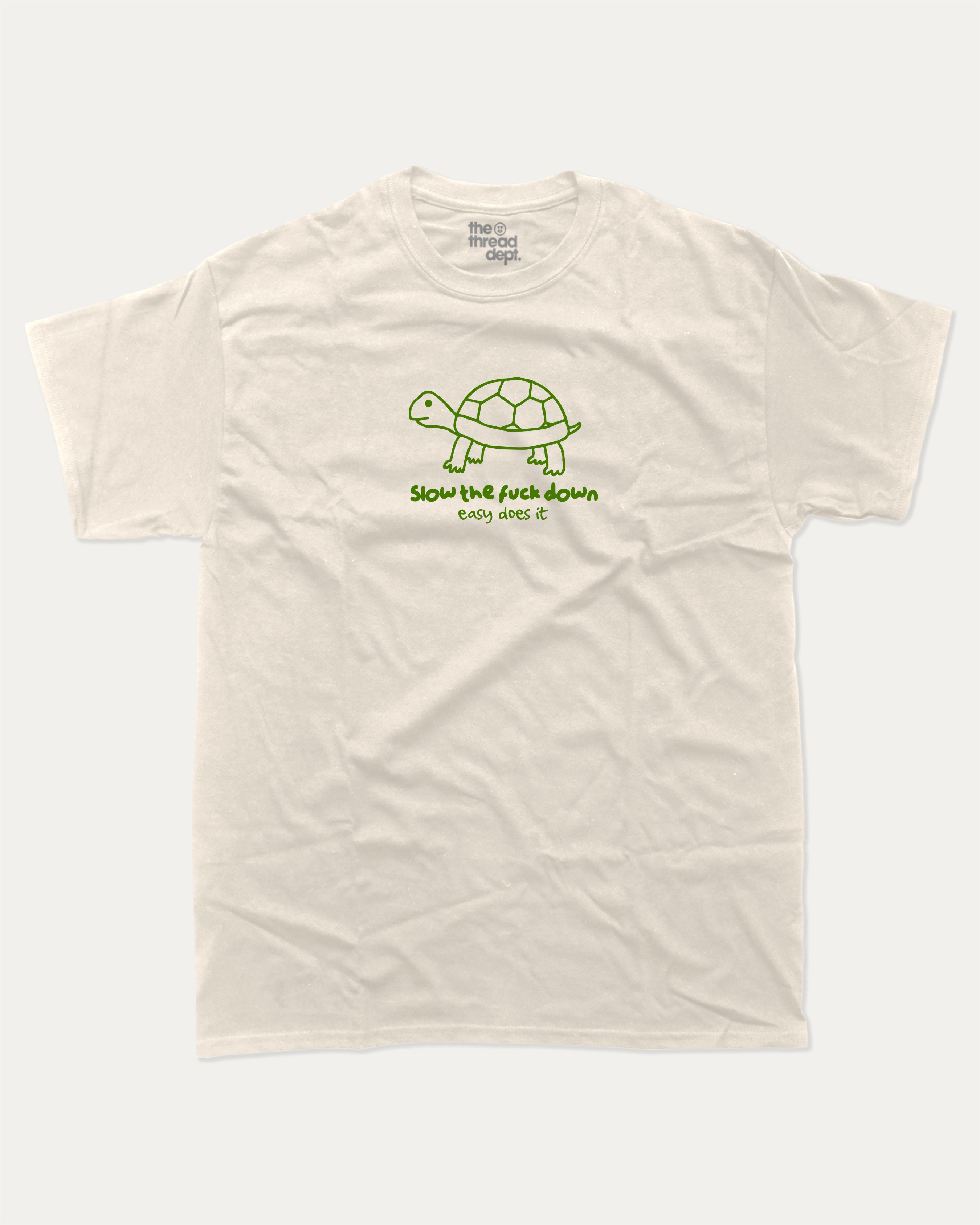 Slow the Fuck Down graphic tee with bold and humorous print, funny and trendy  graphic. T shirt for Animal Lover, Funny Turtle T shirt, Funny Animal Graphic T shirt,  Perfect for adults and gift-giving. Cream shirt.