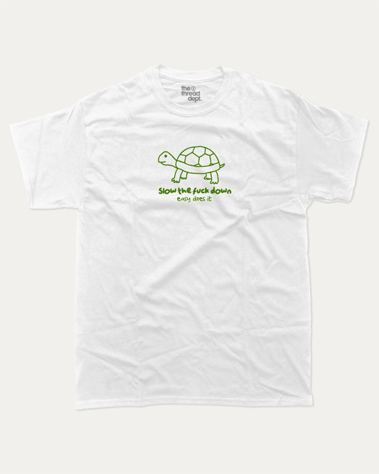 Slow the Fuck Down graphic tee with bold and humorous print, funny and trendy  graphic. T shirt for Animal Lover, Funny Turtle T shirt, Funny Animal Graphic T shirt,  Perfect for adults and gift-giving. White shirt.