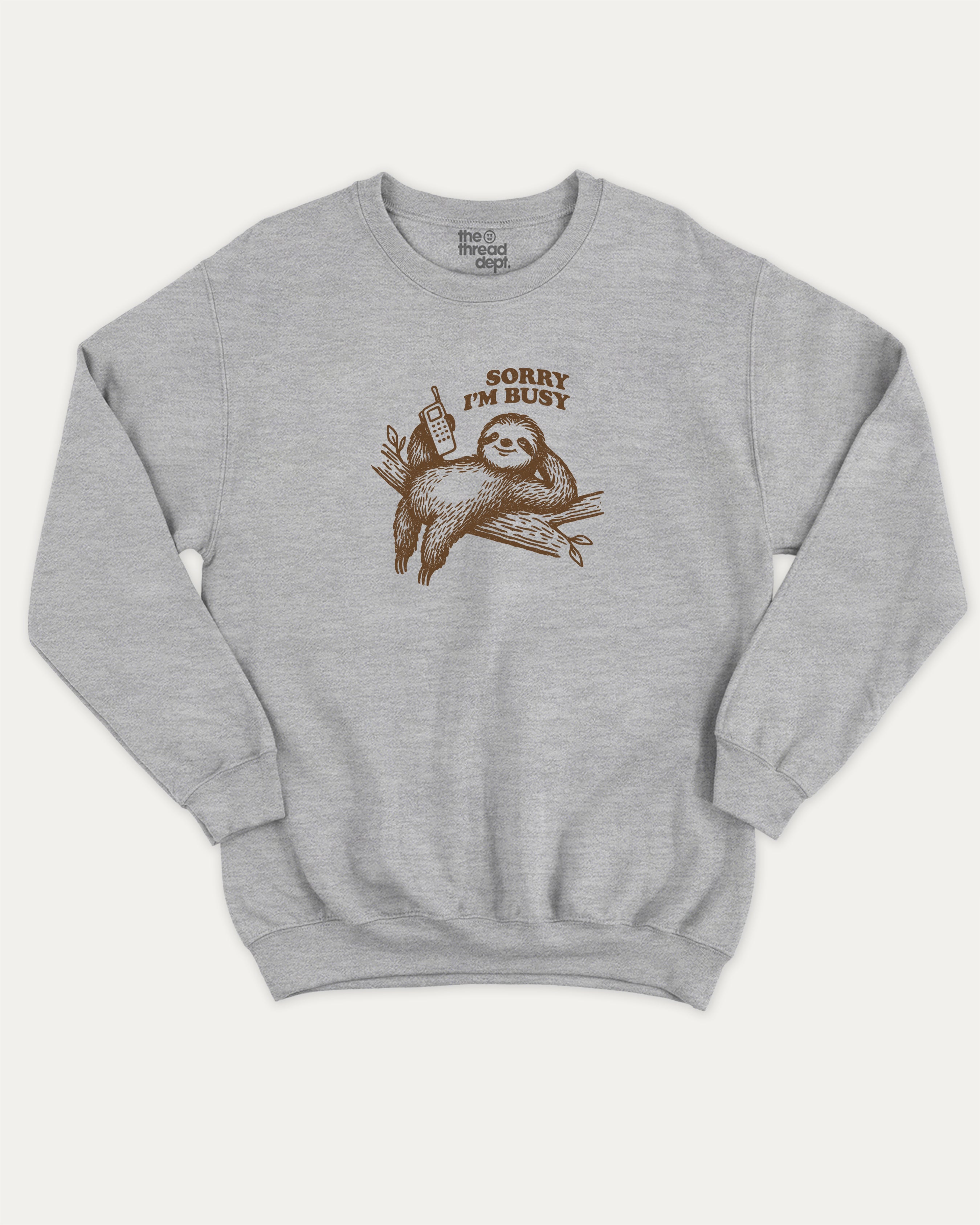 Sorry I'm Busy graphic sweatshirt with funny sloth print, warm and cozy graphic for everyday wear. Perfect for adults and gift-giving. Heather Grey pullover.