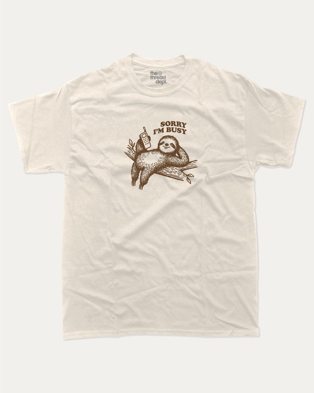 Sorry I'm Busy graphic tee with funny sloth print, funny and trendy graphic. Perfect for adults and gift-giving. Cream shirt.