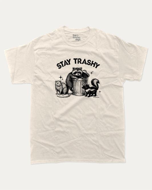 Stay Trashy Squad Team graphic t-shirt, perfect for adults. A must-have funny tee, trending meme shirt, unique gift idea. Cream.