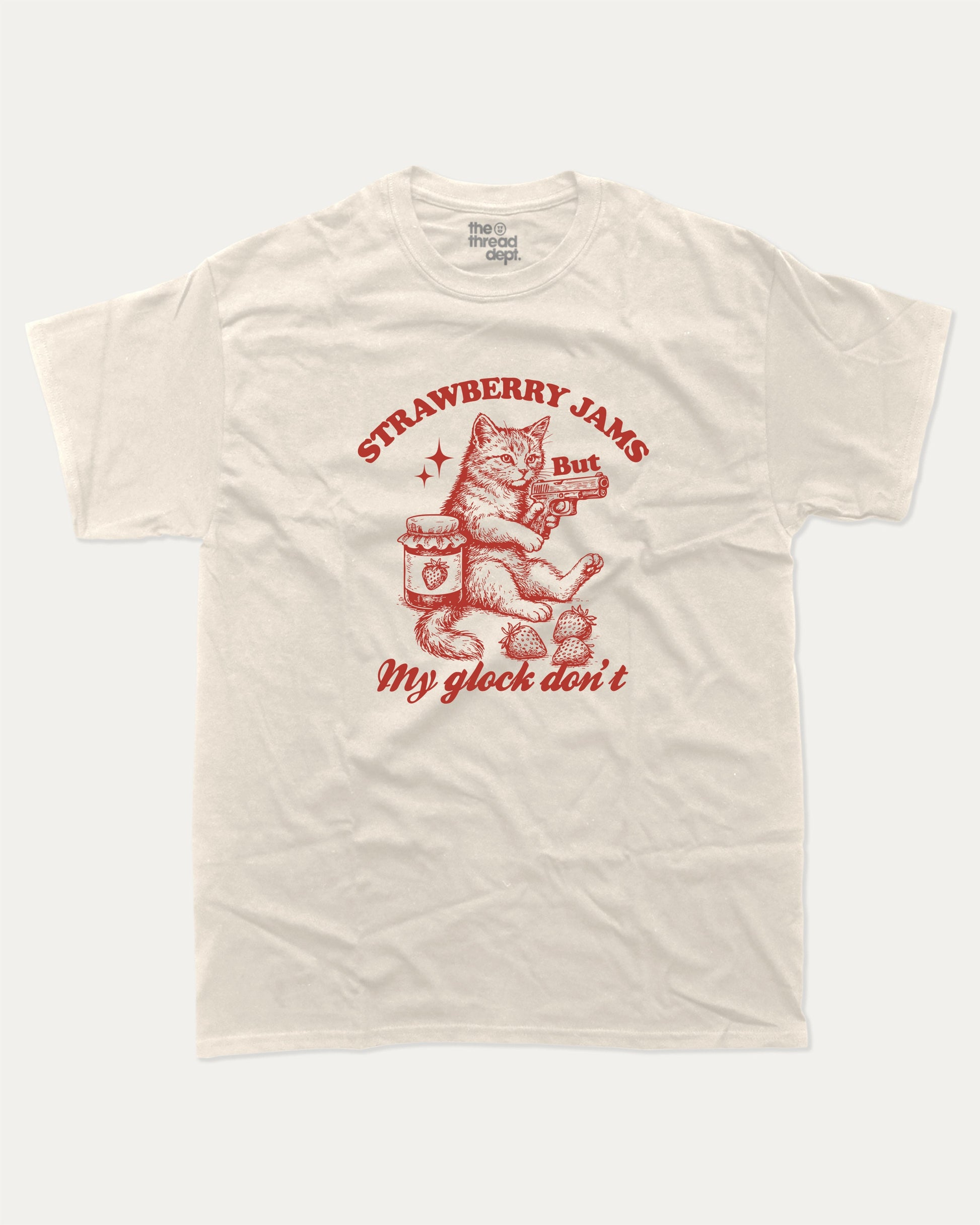 Strawberry Jams graphic tee with bold and humorous print, funny and trendy Animal Lover Graphic T shirt, Cat Lover Tee, Retro Animal Graphic T shirt, Retro Cat Graphic T shirt, Perfect for adults and gift-giving. Cream shirt.