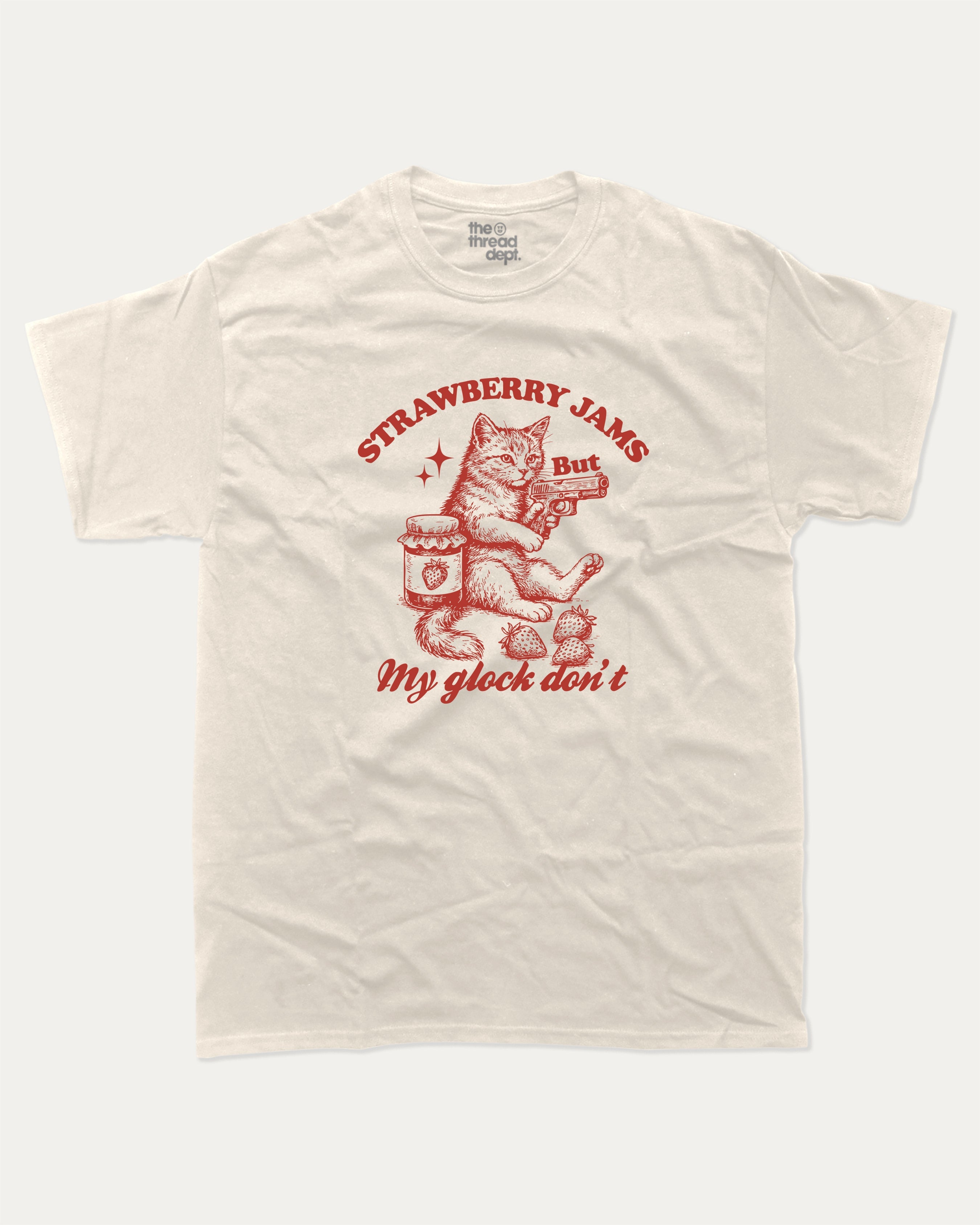 Strawberry Jams graphic tee with bold and humorous print, funny and trendy Animal Lover Graphic T shirt, Cat Lover Tee, Retro Animal Graphic T shirt, Retro Cat Graphic T shirt, Perfect for adults and gift-giving. Cream shirt.