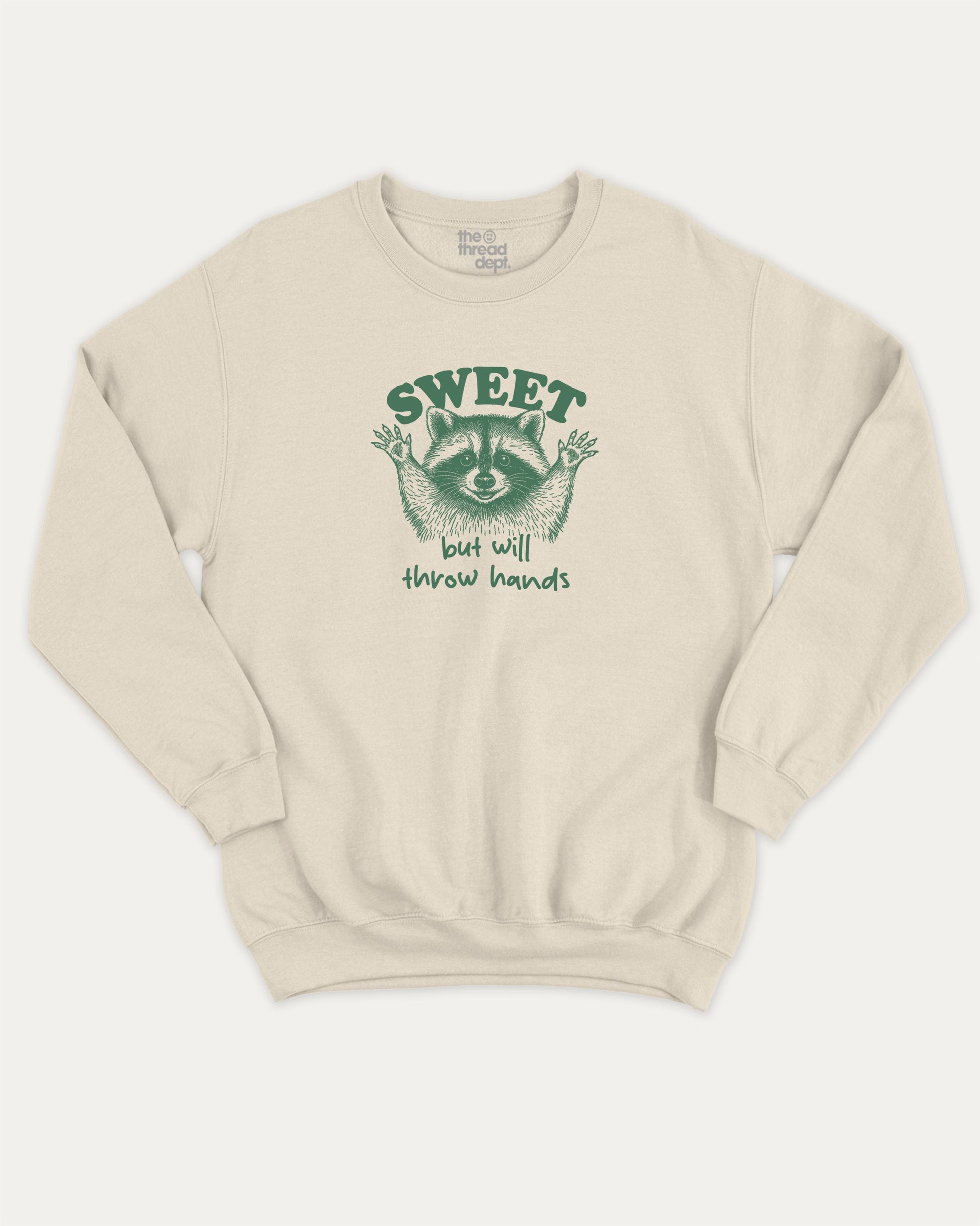 Sweet But Will Throw Hands Raccoon pullover sweatshirt, perfect for adults. Funny raccoon graphic pullover, comfy cold-weather wear, bold casual look. Natural sweater
