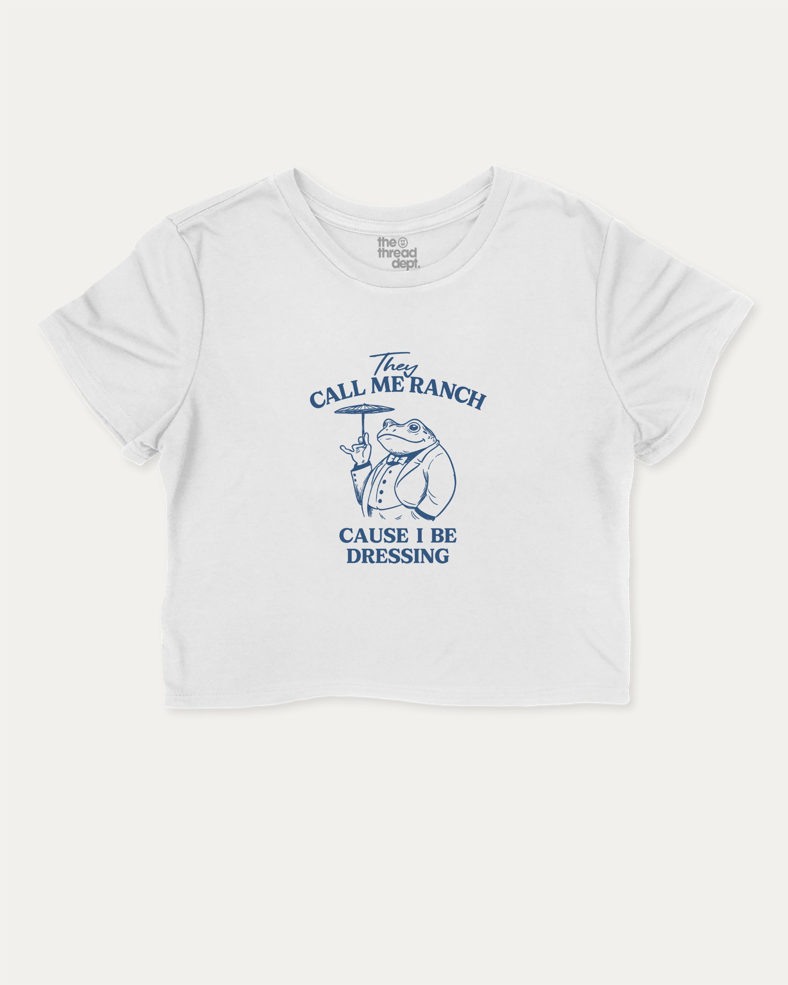 They Call Me Ranch Cause I Be Dressing graphic crop tee with funny and trendy slogan print, perfect for women’s casual looks or layering. White crop t-shirt.