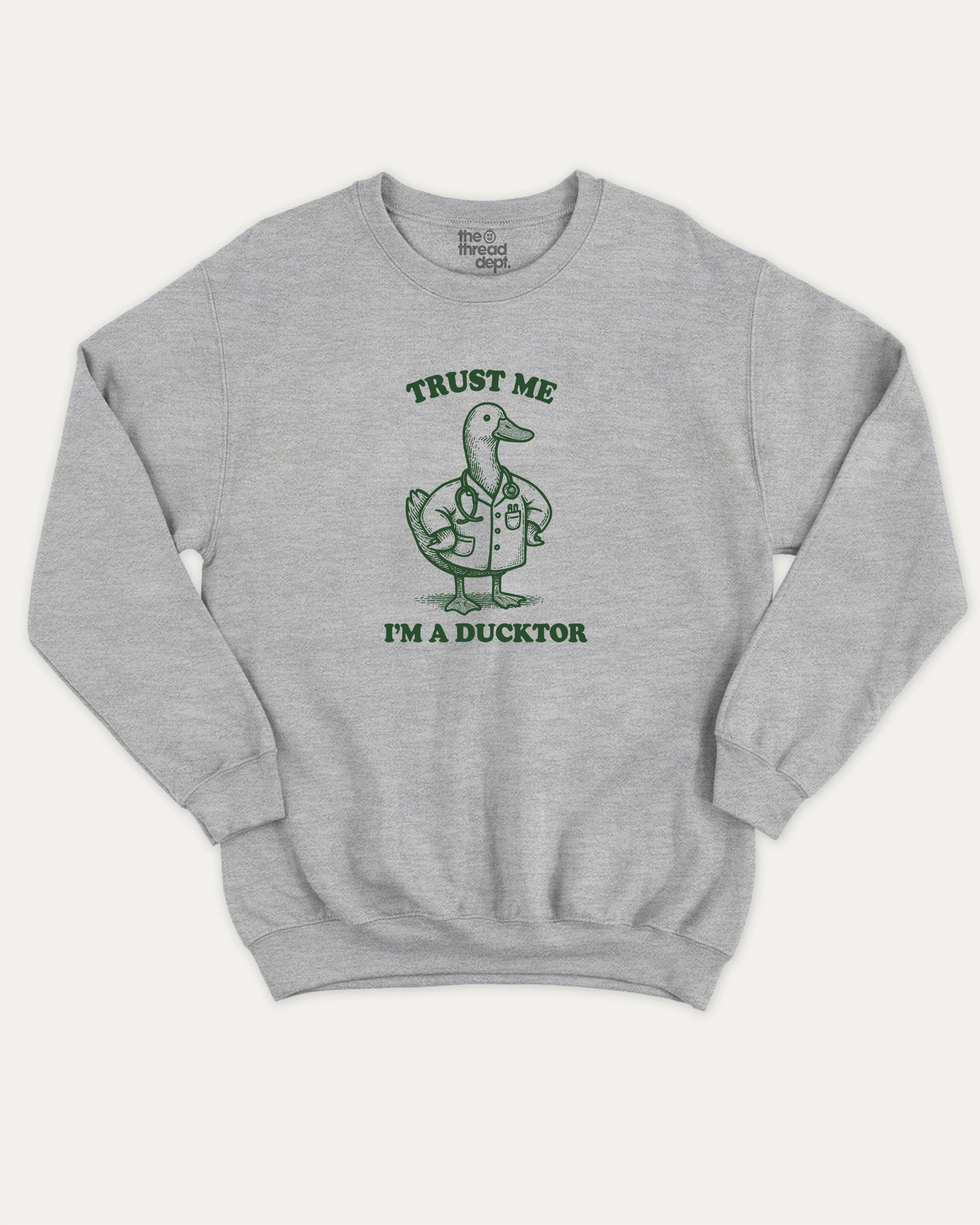 Trust Me I'm A Ducktor pullover sweatshirt, perfect for gifts. A must-have duck graphic pullover, comfy cold-weather wear, bold casual look. Heather Grey sweater
