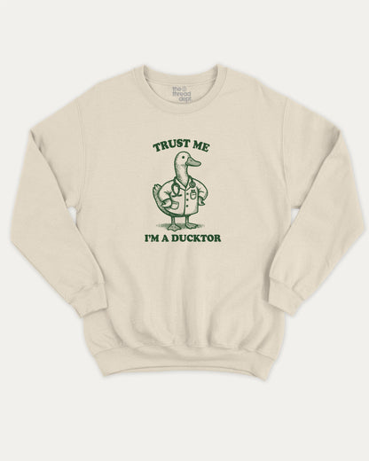Trust Me I'm A Ducktor pullover sweatshirt, perfect for gifts. A must-have duck graphic pullover, comfy cold-weather wear, bold casual look. Natural sweater