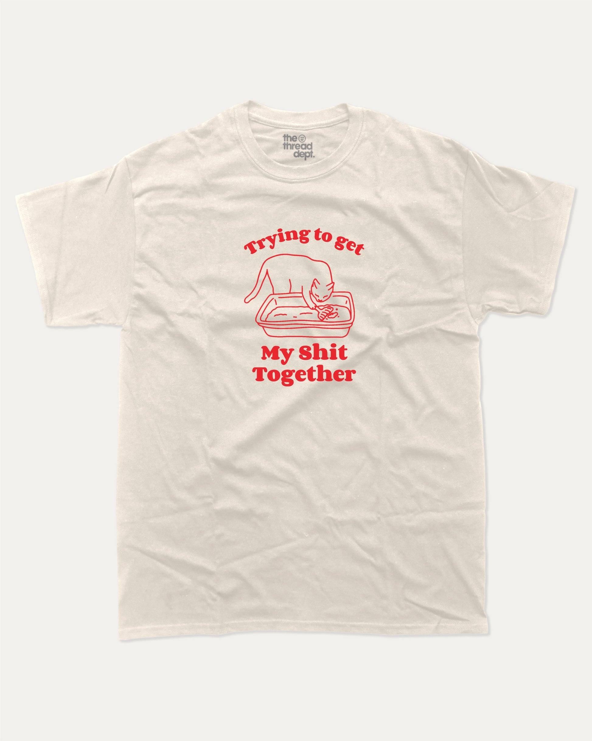 Trying To Get My Shit Together graphic t-shirt, Funny Animal Graphic T shirt, Humorous Animal T shirt, Cute Animal Graphic T shirt, A must-have funny tee, trending meme shirt, unique gift idea. Cream.