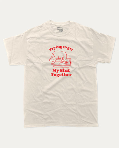 Trying To Get My Shit Together graphic t-shirt, Funny Animal Graphic T shirt, Humorous Animal T shirt, Cute Animal Graphic T shirt, A must-have funny tee, trending meme shirt, unique gift idea. Cream.