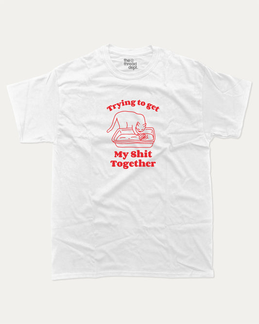 Trying To Get My Shit Together graphic t-shirt, Funny Animal Graphic T shirt, Humorous Animal T shirt, Cute Animal Graphic T shirt, A must-have funny tee, trending meme shirt, unique gift idea. White.