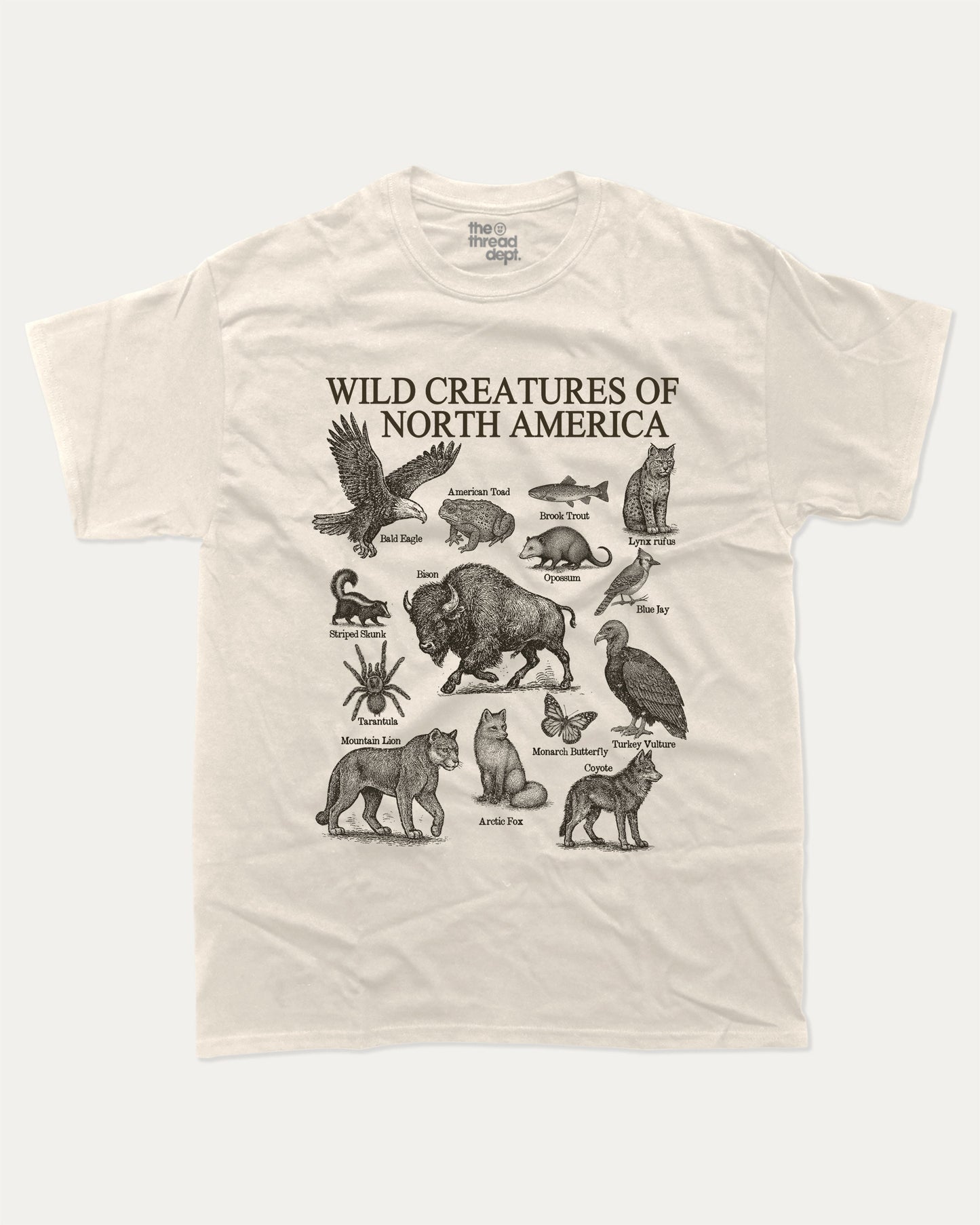 Wild Creatures of North America graphic t-shirt, Animal T shirt, Saving Animals T shirt, North America's Animal T shirt, A must-have funny tee, trending meme shirt, unique gift idea. Cream.