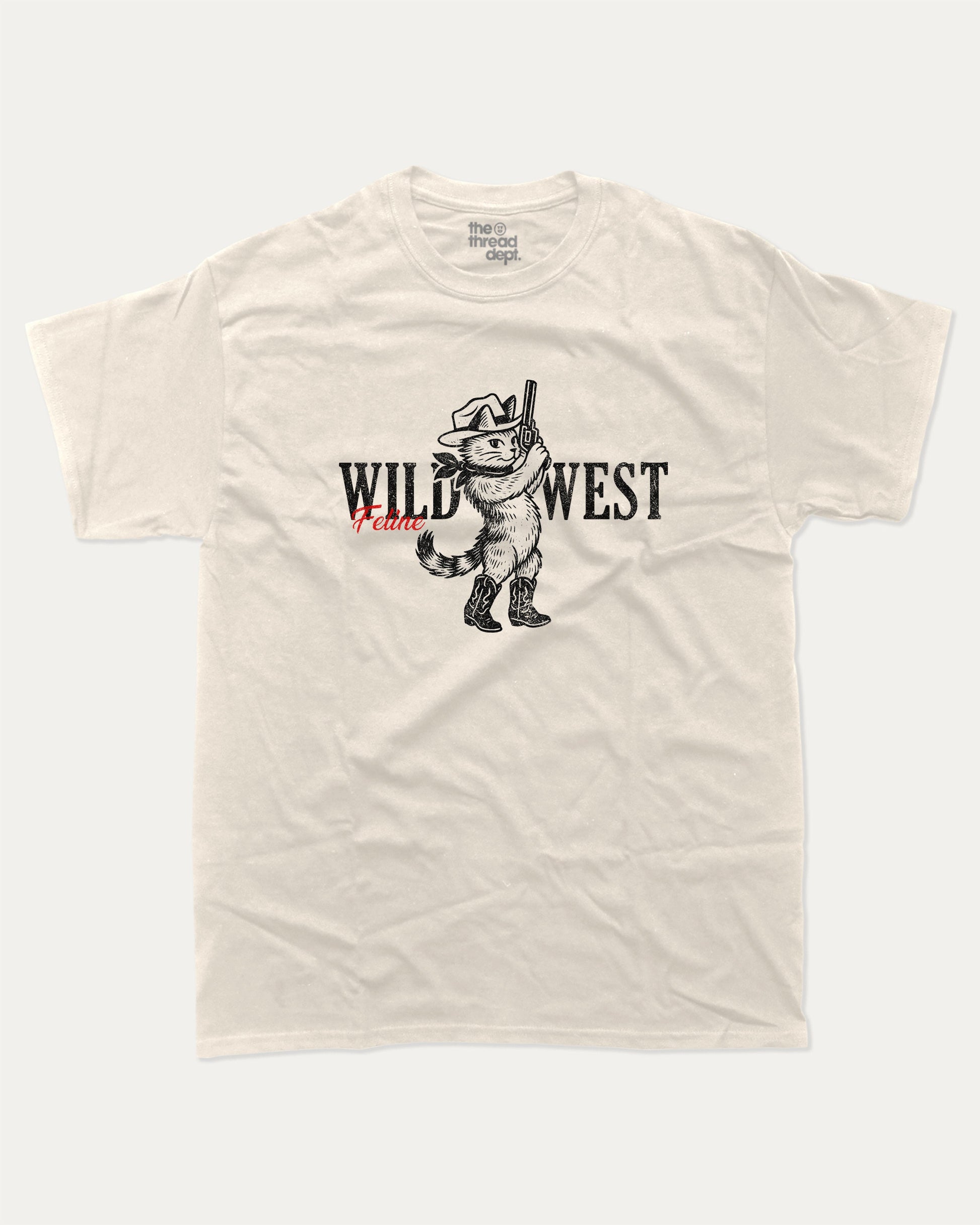 Wild West Feline graphic t-shirt, Vintage-style animal graphic T-shirt featuring playful dog and cat illustrations, Cute cartoon animals printed on retro aesthetic T-shirt design. A must-have funny tee, trending meme shirt, unique gift idea. Cream.