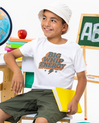 Child wearing a white t-shirt with 'BIG WHIP ENERGY' text in a classroom setting