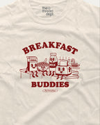 White t-shirt with red 'Breakfast Buddies' graphic featuring cartoon cereal box, milk carton, bowl of cereal, and toaster.
