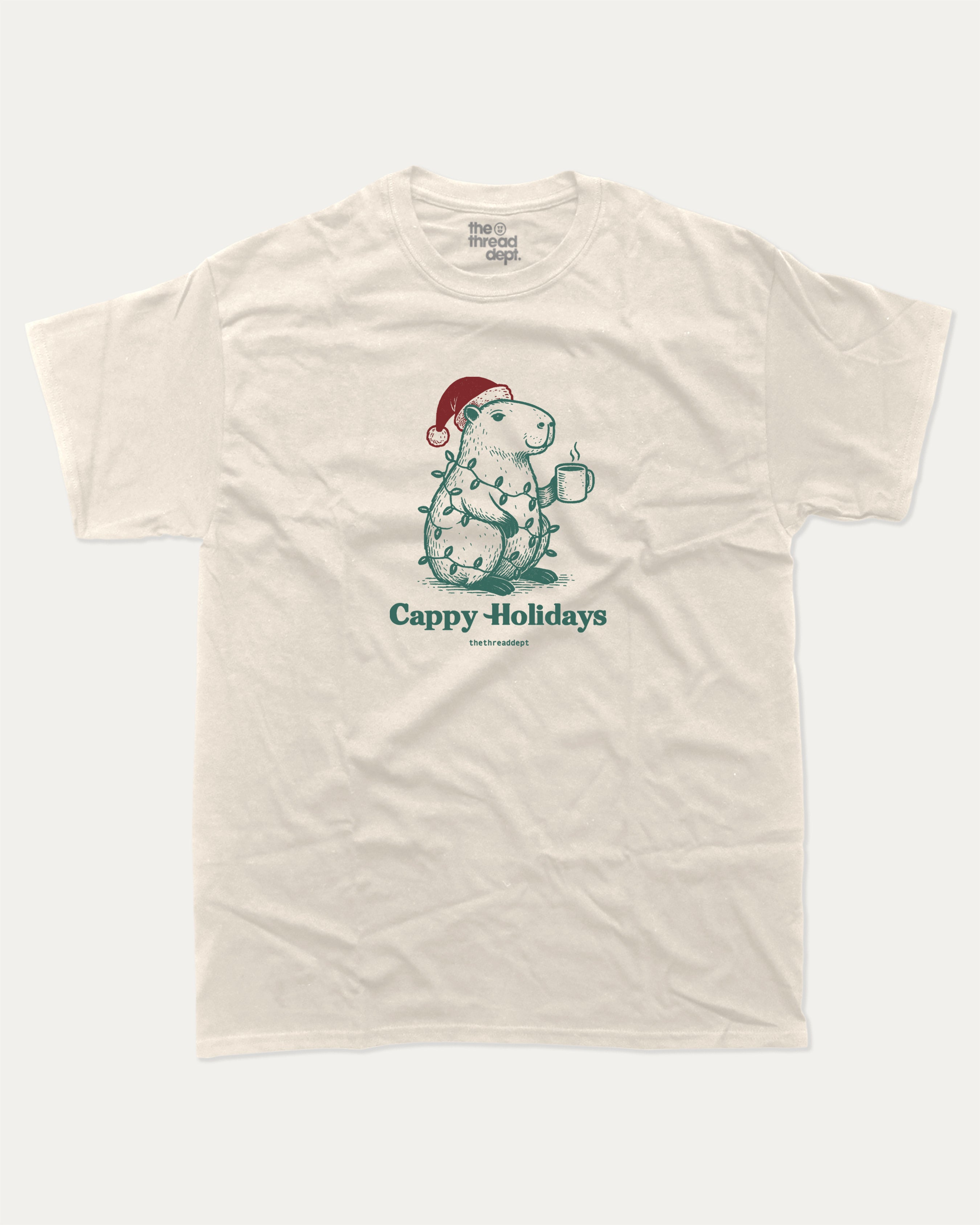 Cappy Holidays graphic tee with bold and humorous print, Perfect Gift for Christmas, Christmas Gift, X-mas Gift for friends, funny and trendy graphic. Perfect for adults and gift-giving. Cream shirt.