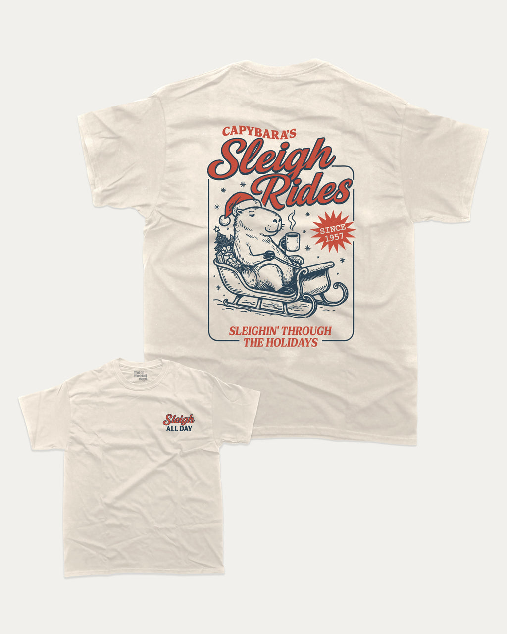 Capybara's Sleigh Rides graphic tee with bold and humorous print, Perfect Gift for Christmas, X Mas Graphic T shirt, X-mas Gift, funny and trendy graphic. Perfect for adults and gift-giving. Cream shirt.