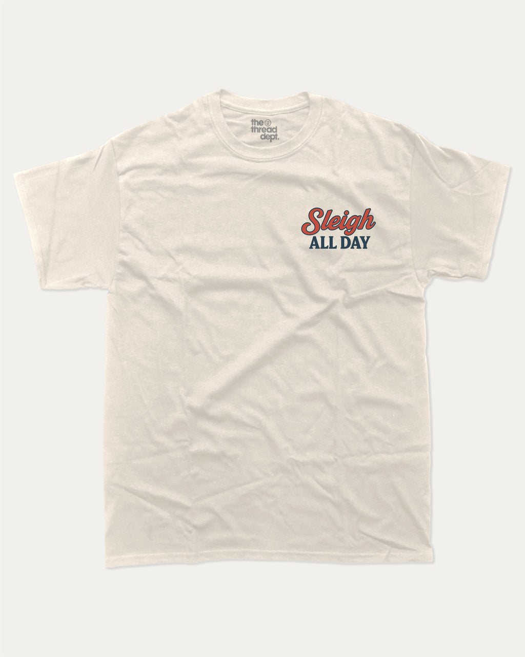 Capybara's Sleigh Rides graphic tee with bold and humorous print, Perfect Gift for Christmas, X Mas Graphic T shirt, X-mas Gift, funny and trendy graphic. Perfect for adults and gift-giving. Cream shirt.