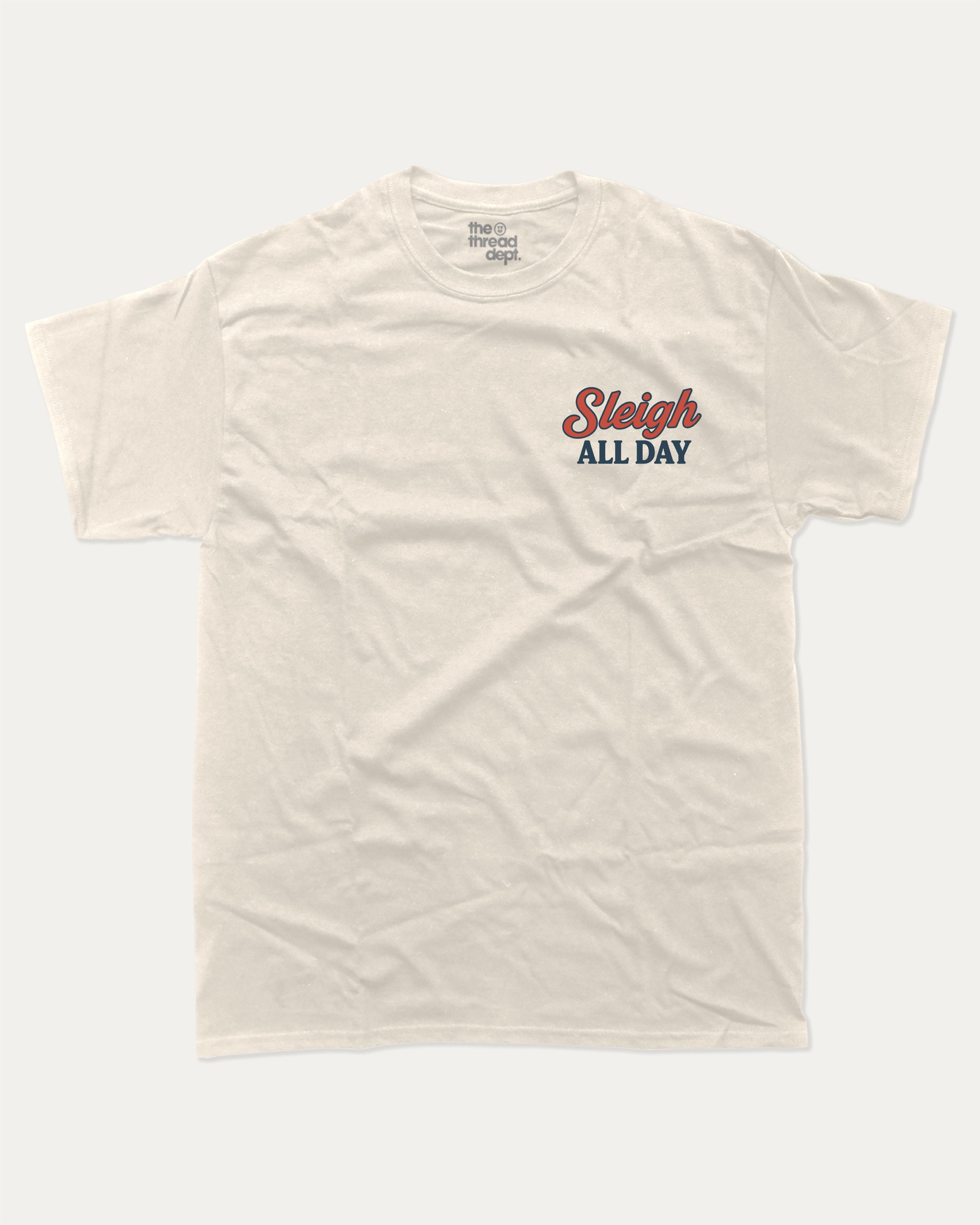 Capybara's Sleigh Rides graphic tee with bold and humorous print, Perfect Gift for Christmas, X Mas Graphic T shirt, X-mas Gift, funny and trendy graphic. Perfect for adults and gift-giving. Cream shirt.