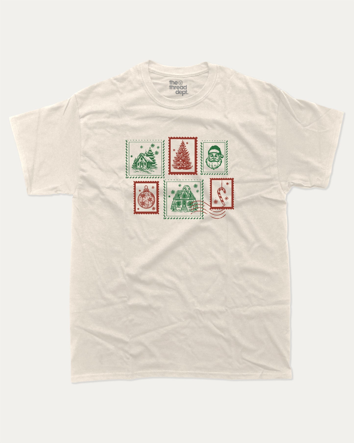 Christmas Stamp graphic tee with bold and humorous print, Perfect Gift for Christmas, Christmas Gift, X-mas Gift for friends, funny and trendy graphic. Perfect for adults and gift-giving. Cream shirt.