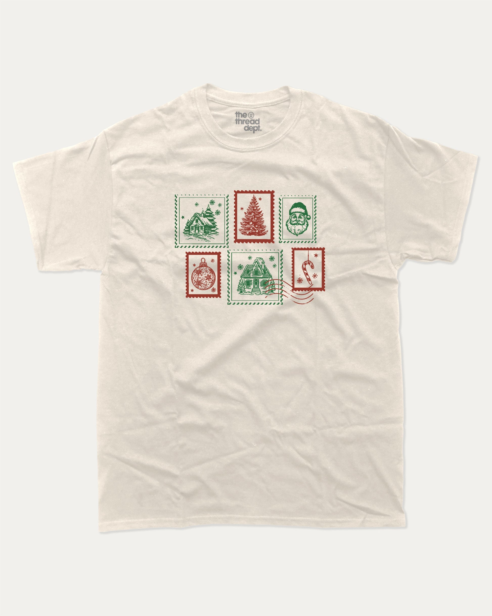 Christmas Stamp graphic tee with bold and humorous print, Perfect Gift for Christmas, Christmas Gift, X-mas Gift for friends, funny and trendy graphic. Perfect for adults and gift-giving. Cream shirt.