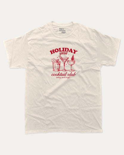 Holiday Spirit Cocktail Club graphic tee with bold and humorous print, funny and trendy graphic. Christmas Gift T shirt, X-mas Graphic T shirt, Drinks lover T shirt,  Perfect for adults and gift-giving. Cream shirt.