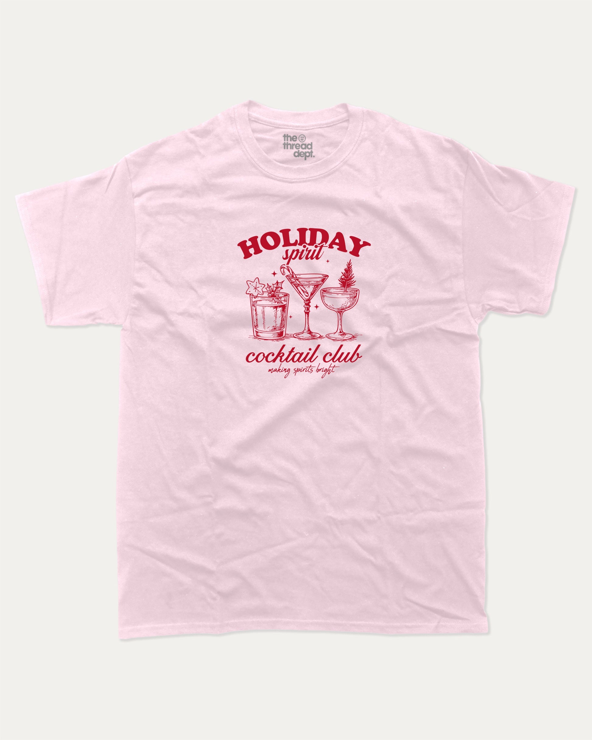 Holiday Spirit Cocktail Club graphic tee with bold and humorous print, funny and trendy graphic. Christmas Gift T shirt, X-mas Graphic T shirt, Drinks lover T shirt,  Perfect for adults and gift-giving. Pink shirt.