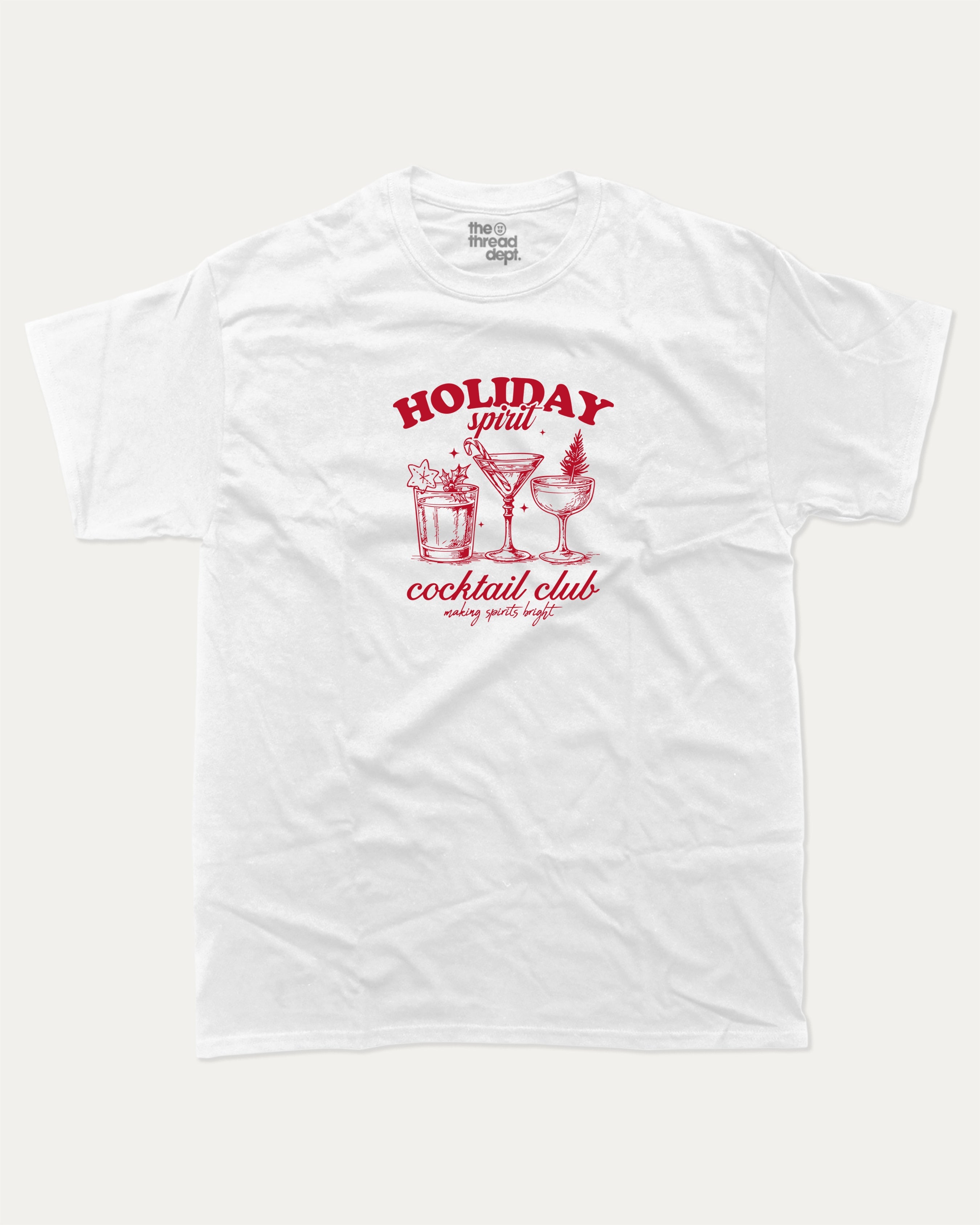 Holiday Spirit Cocktail Club graphic tee with bold and humorous print, funny and trendy graphic. Christmas Gift T shirt, X-mas Graphic T shirt, Drinks lover T shirt,  Perfect for adults and gift-giving. White shirt.