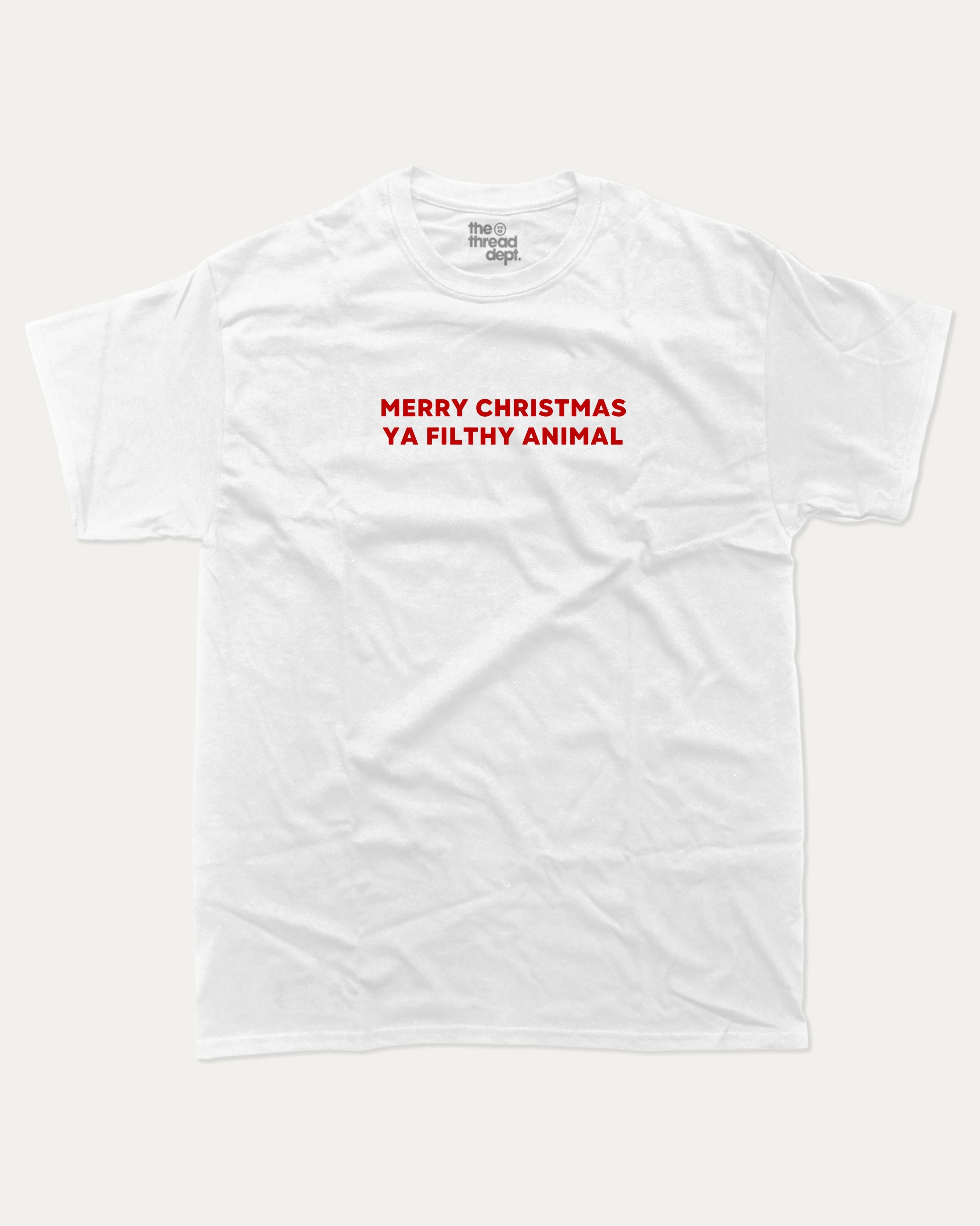 Merry Christmas Ya Filthy Animal graphic tee with bold and humorous print, Perfect Gift for Christmas, X Mas Graphic T shirt, X-mas Gift, funny and trendy graphic. Perfect for adults and gift-giving. White shirt.