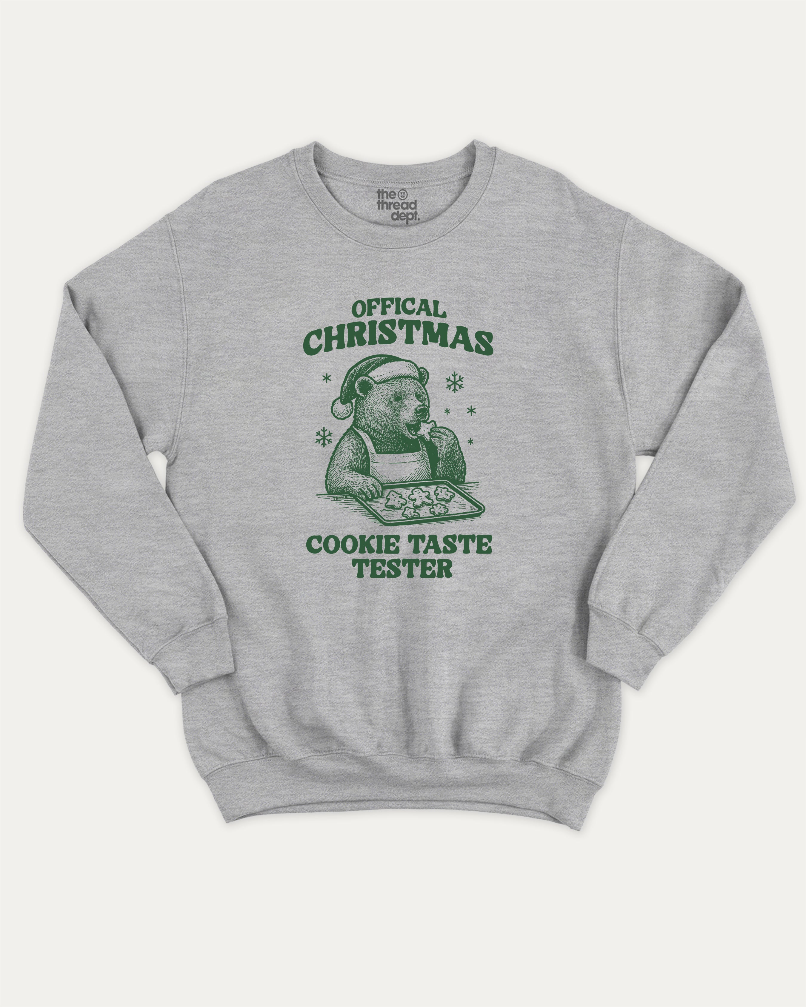 Official Christmas Cookie Taste Tester graphic sweatshirt with bold and humorous print, warm and cozy graphic for everyday wear. Perfect Gift for Christmas, X-Mas Gift,  Perfect for adults and gift-giving. Heather Grey pullover.