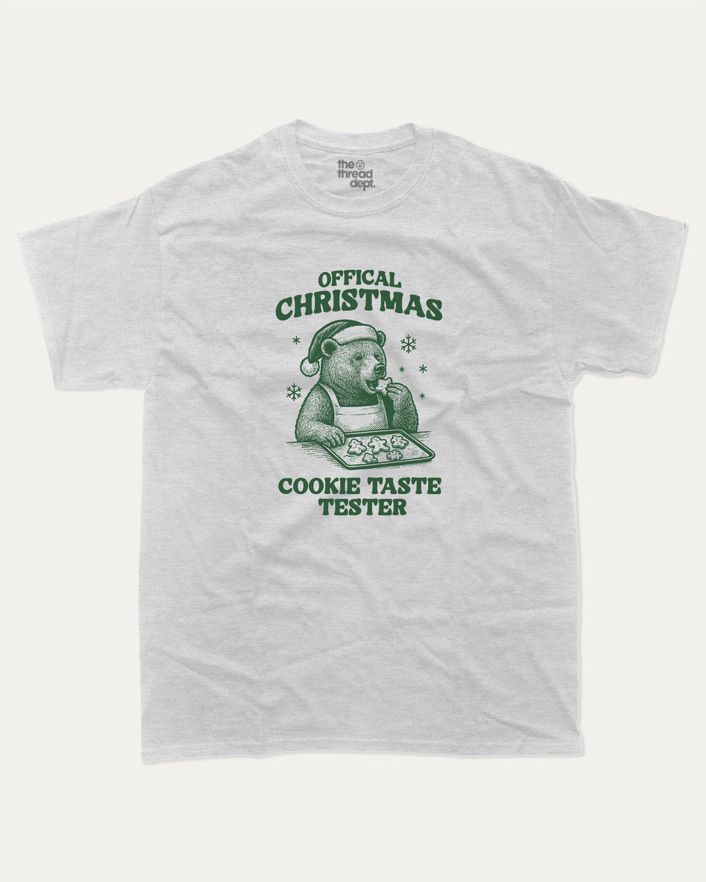 Official Christmas Cookie Taste Tester graphic tee with bold and humorous print, funny and trendy graphic. Perfect Gift for Christmas, X-Mas Gift,  Perfect for adults and gift-giving. Ash Grey shirt.
