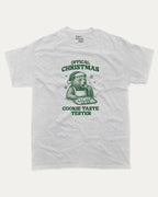 Official Christmas Cookie Taste Tester graphic tee with bold and humorous print, funny and trendy graphic. Perfect Gift for Christmas, X-Mas Gift,  Perfect for adults and gift-giving. Ash Grey shirt.