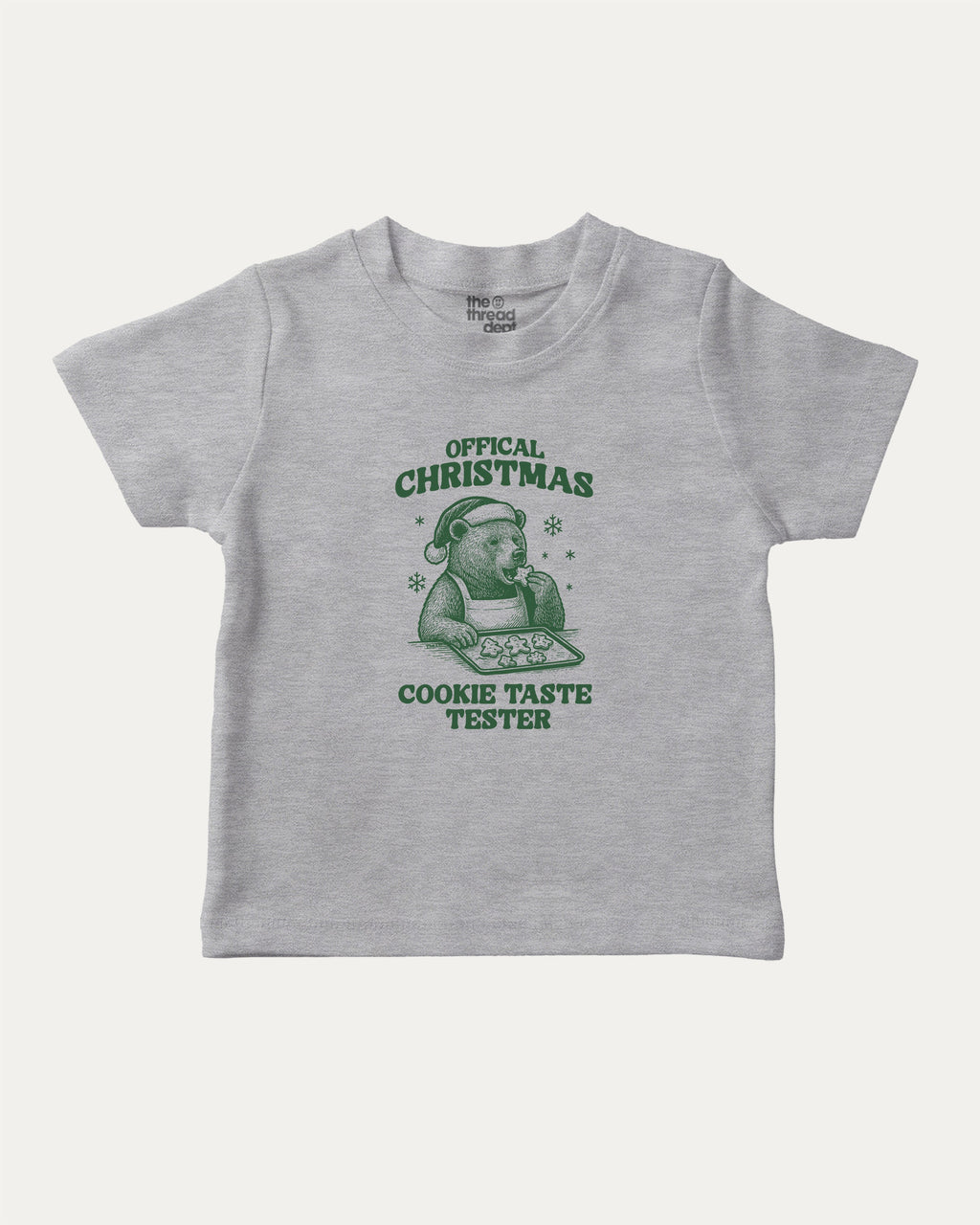 Official Christmas Cookie Taste Tester graphic tee with bold and humorous print, funny and trendy graphic. Perfect Gift for Christmas, X-Mas Gift,  Perfect for adults and gift-giving. Heather Grey shirt.