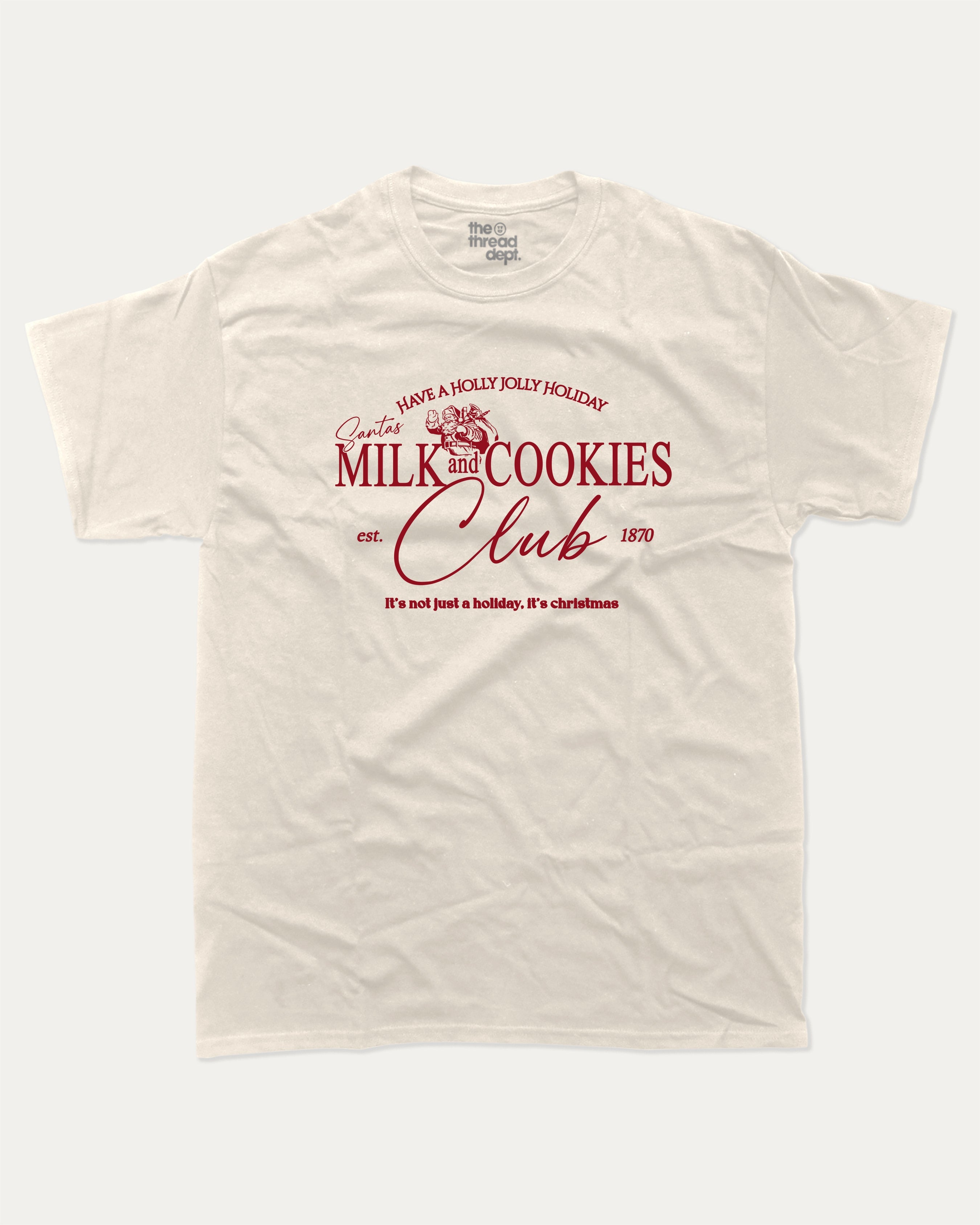 Santa's Milk and cookies graphic tee with bold and humorous print, Perfect Gift for Christmas, X-mas Gift T shirt, Cozy X-mas tee, funny and trendy graphic. Perfect for adults and gift-giving. Cream shirt.