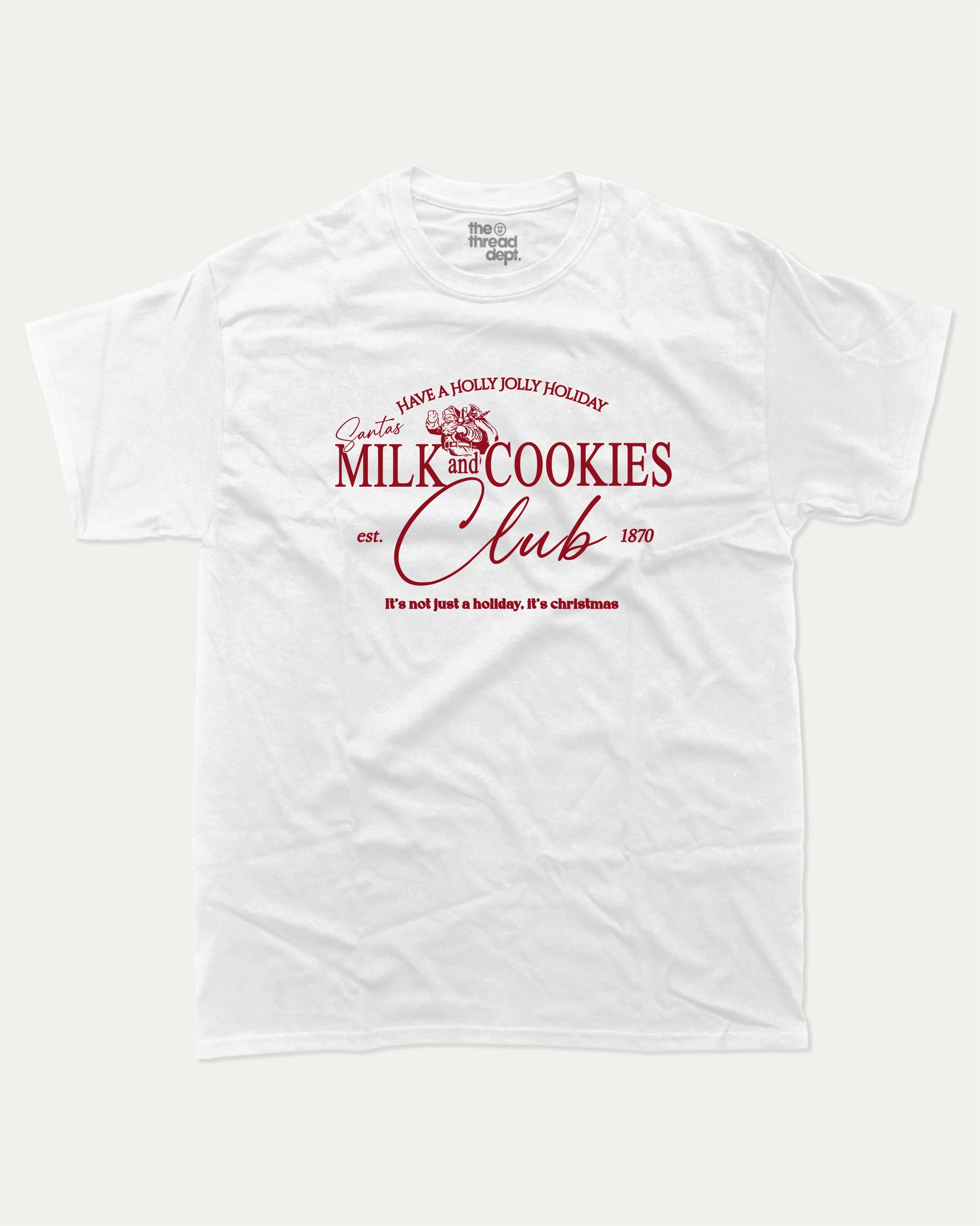 Santa's Milk and cookies graphic tee with bold and humorous print, Perfect Gift for Christmas, X-mas Gift T shirt, Cozy X-mas tee, funny and trendy graphic. Perfect for adults and gift-giving. White shirt.