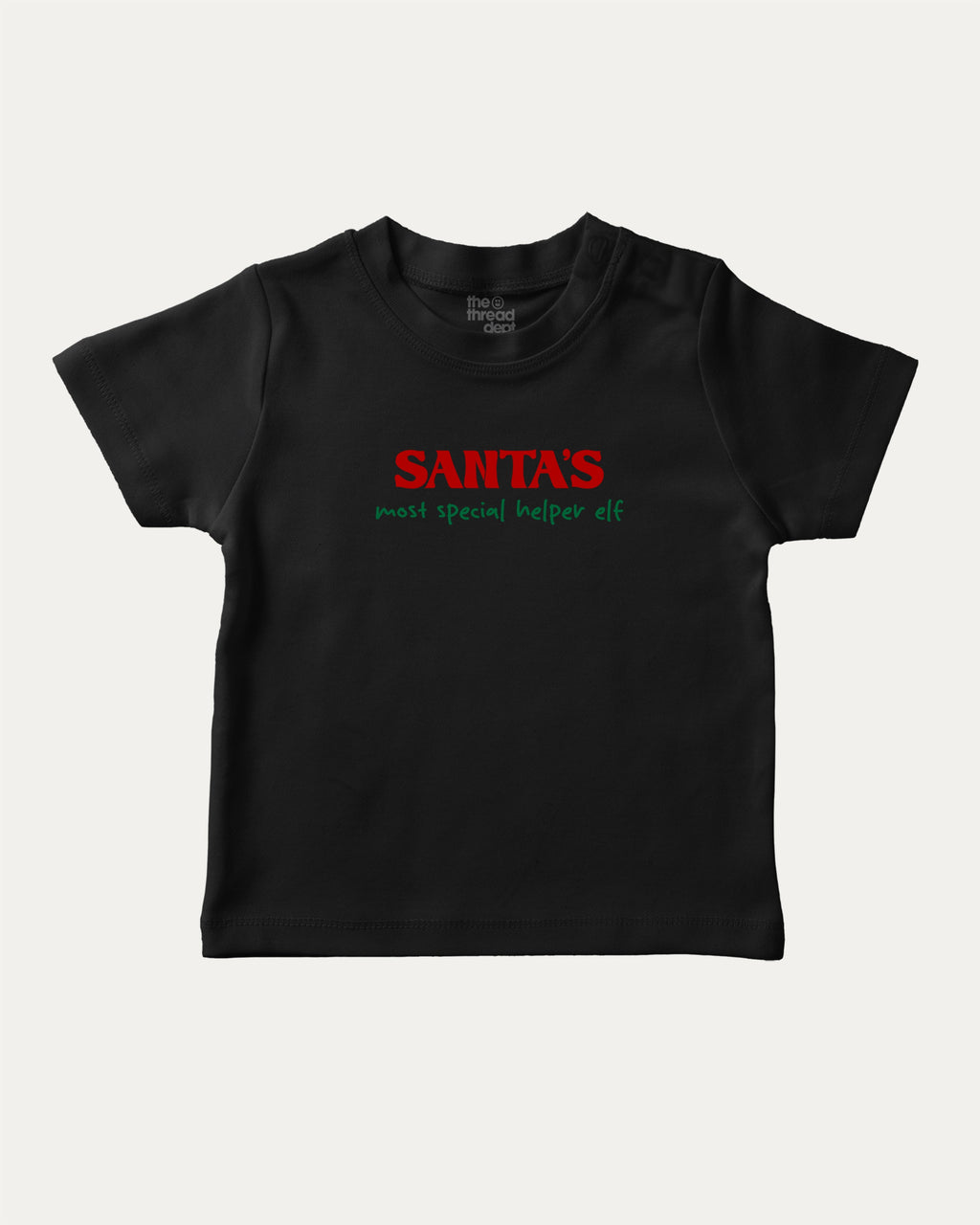 Santa's Most Special Helper graphic tee with bold and humorous print, Perfect Gift for Christmas, Christmas Gift, X-mas Gift for friends, funny and trendy graphic. Perfect for adults and gift-giving. Black shirt.