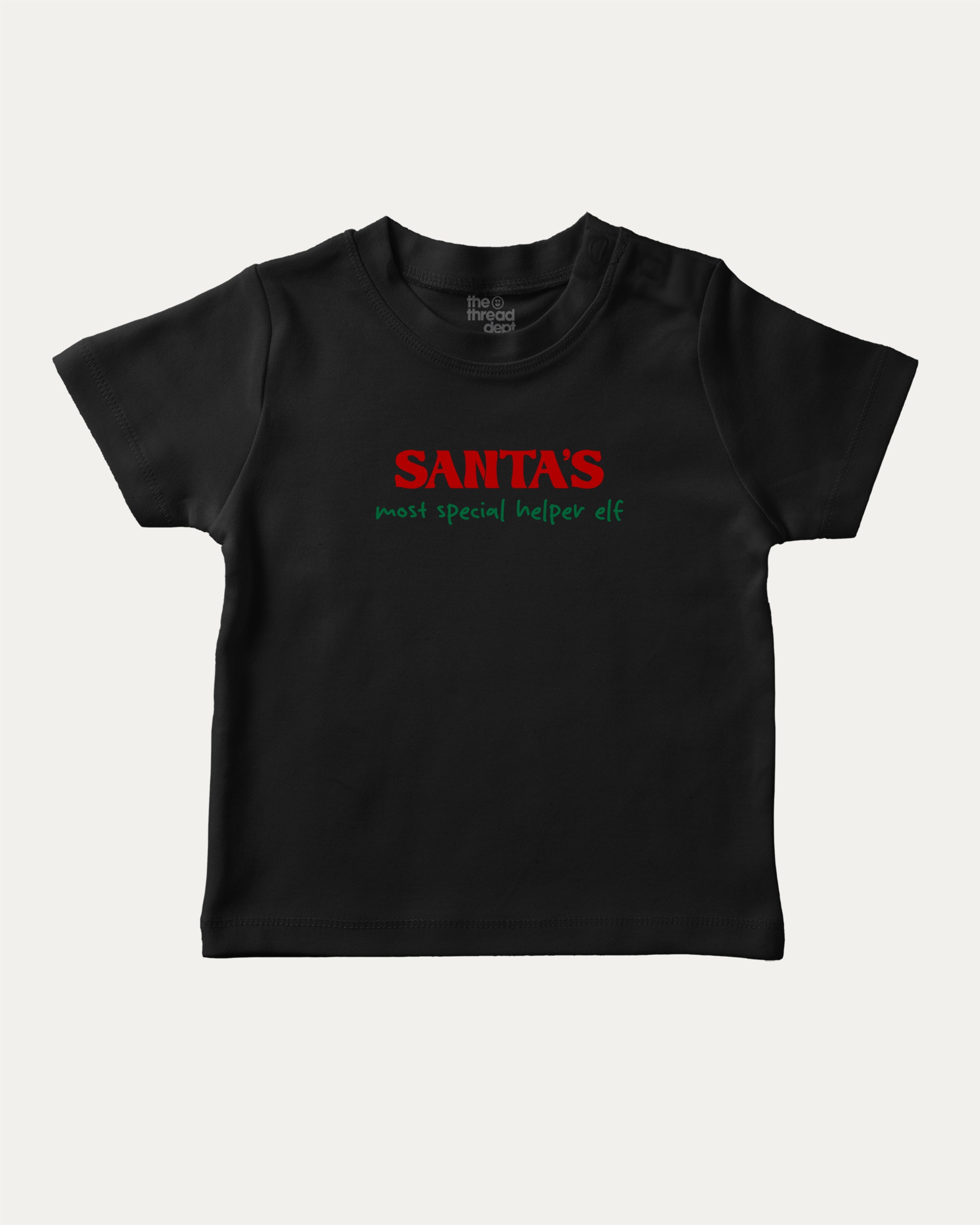 Santa's Most Special Helper graphic tee with bold and humorous print, Perfect Gift for Christmas, Christmas Gift, X-mas Gift for friends, funny and trendy graphic. Perfect for adults and gift-giving. Black shirt.