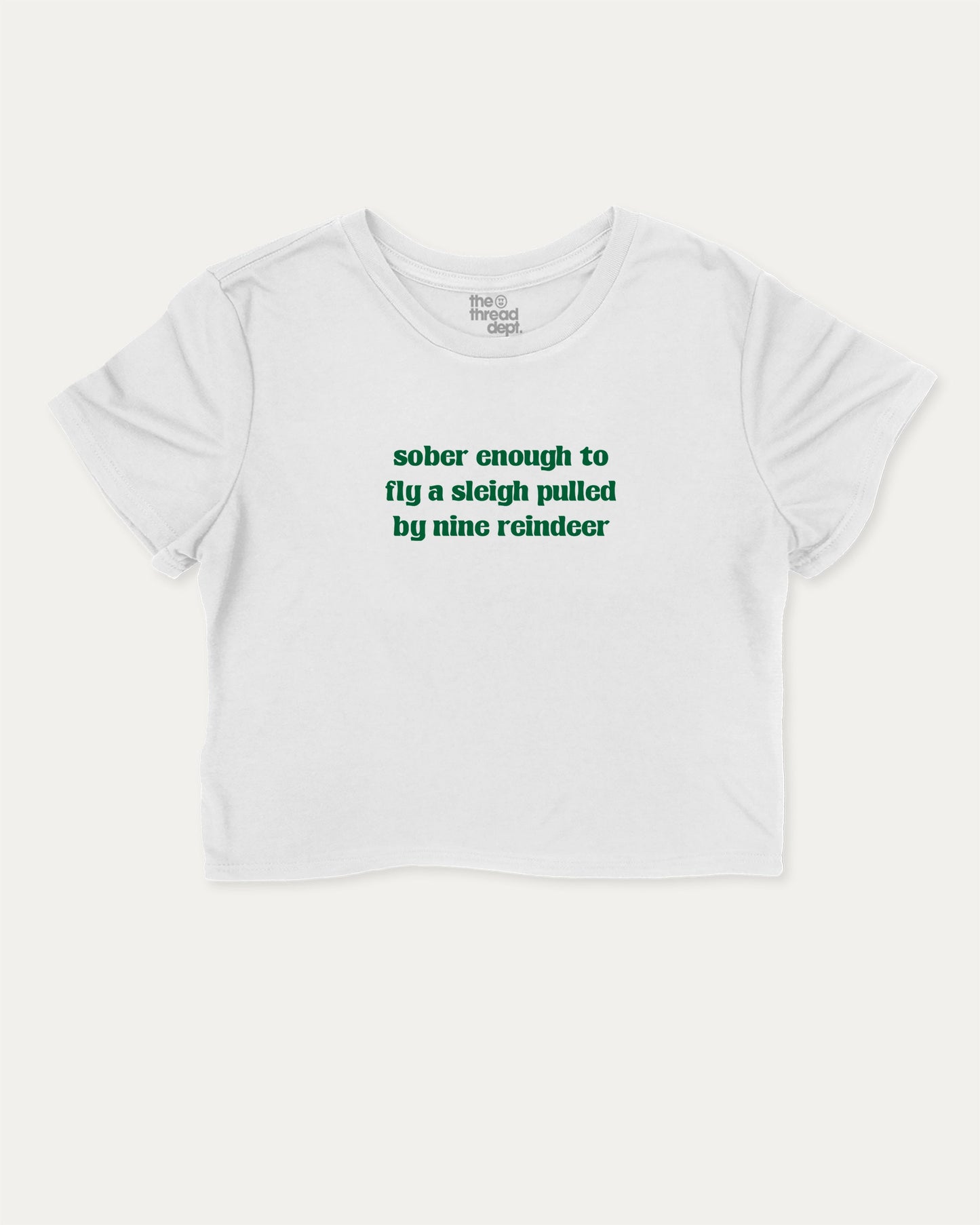Sober Enough To Fly A Sleigh Pulled By Nine Reindeer graphic crop tee with funny and trendy slogan print, Perfect Gift for Christmas, X-mas Gift,  perfect for women’s casual looks or layering. White crop t-shirt.
