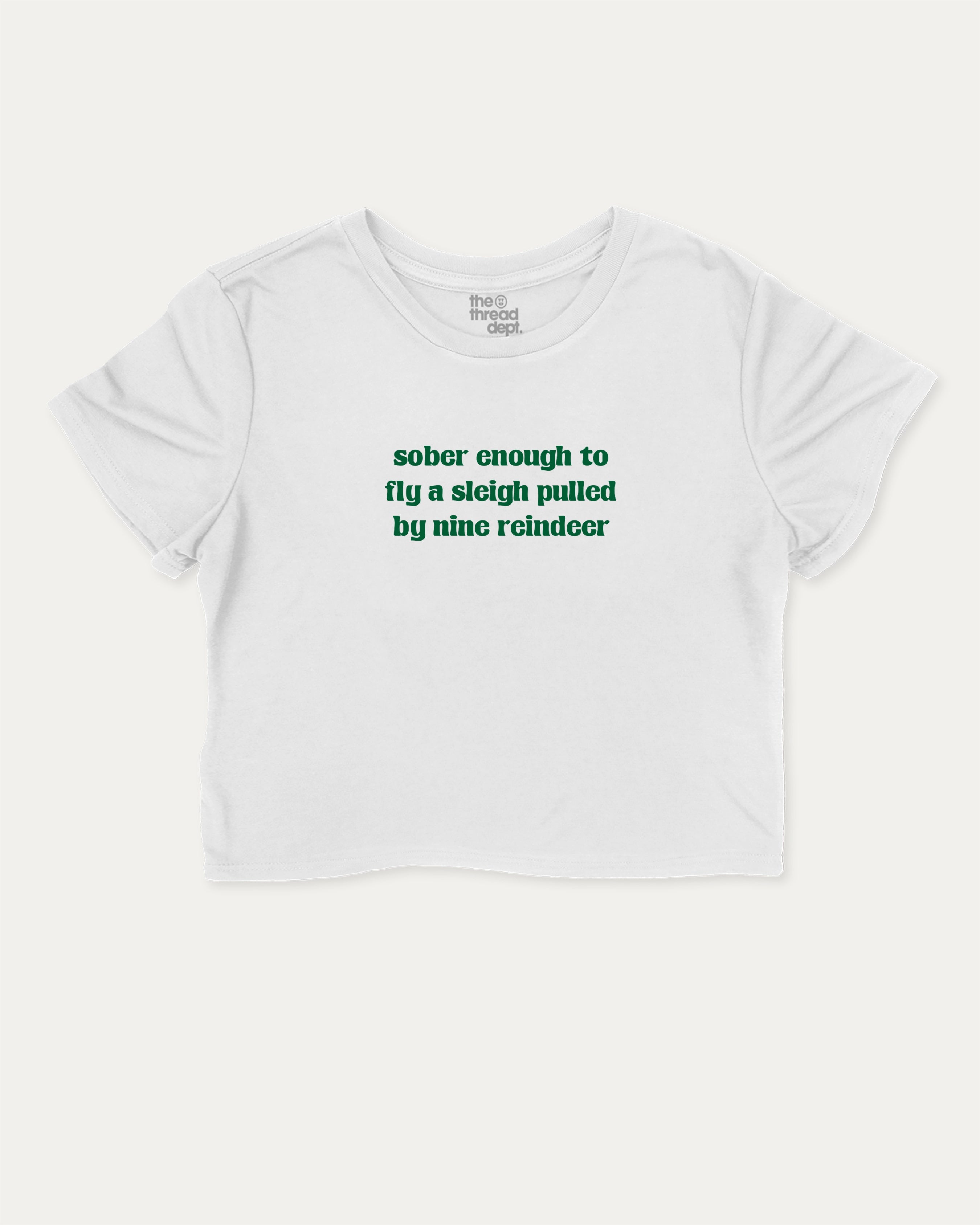 Sober Enough To Fly A Sleigh Pulled By Nine Reindeer graphic crop tee with funny and trendy slogan print, Perfect Gift for Christmas, X-mas Gift,  perfect for women_ casual looks or layering. White crop t-shirt.
