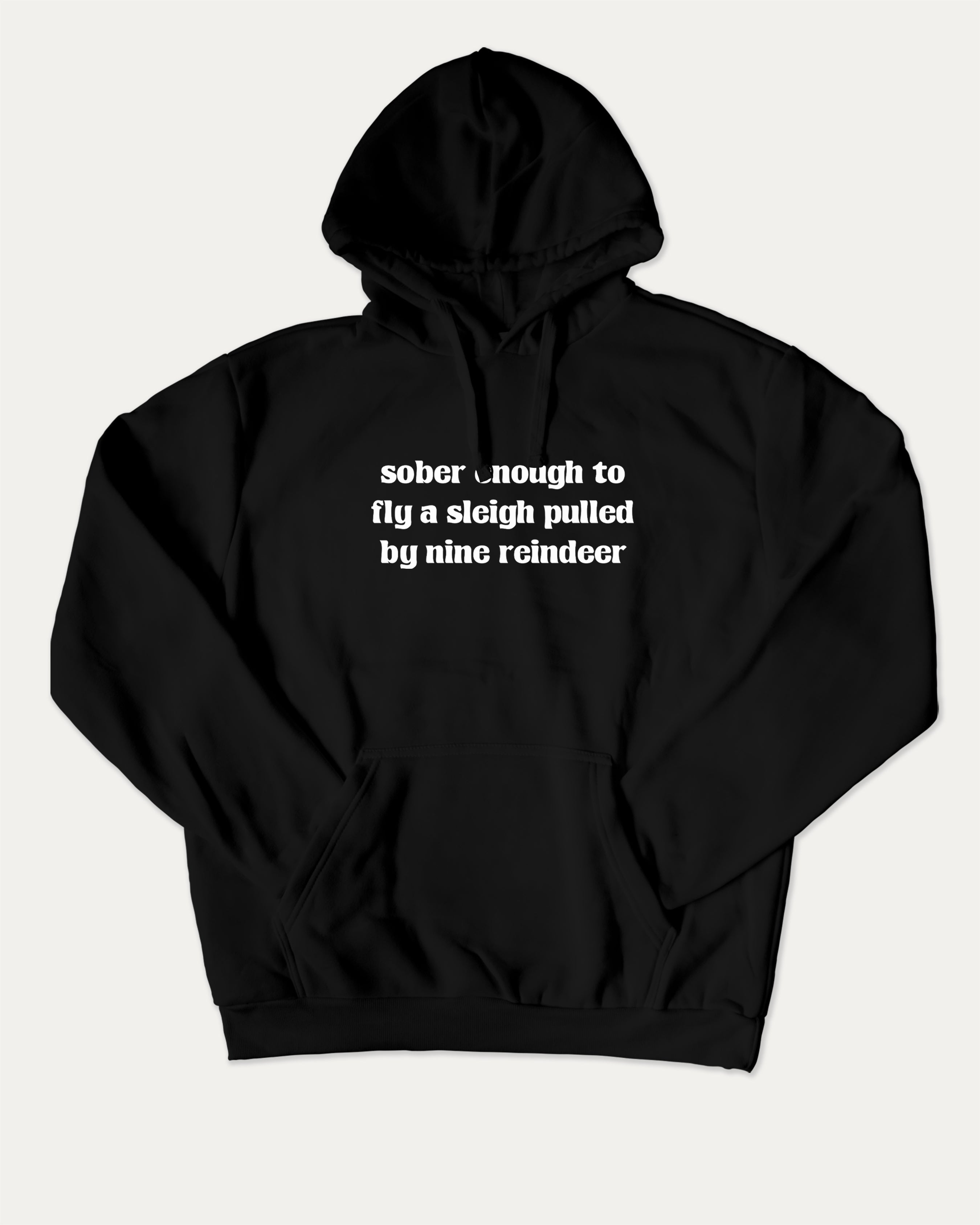 Sober Enough To Fly A Sleigh Pulled By Nine Reindeer graphic hoodie with funny and trendy artwork, casual streetwear with bold personality. Great for adults and gifting. Black hoodie.